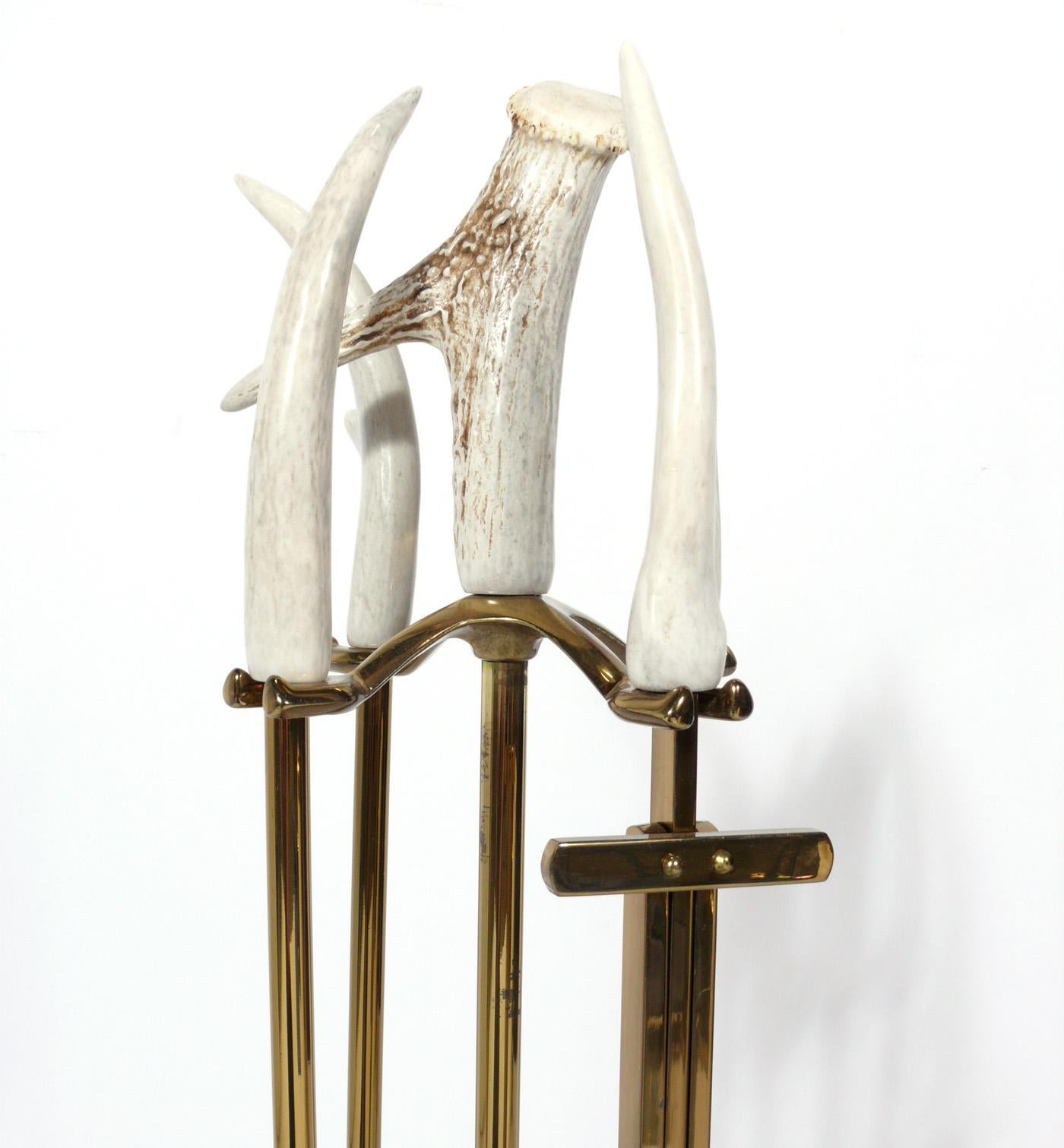 Brass and antler fire tools, probably Italian, circa 1980s. These are heavy and well made with great attention to detail.