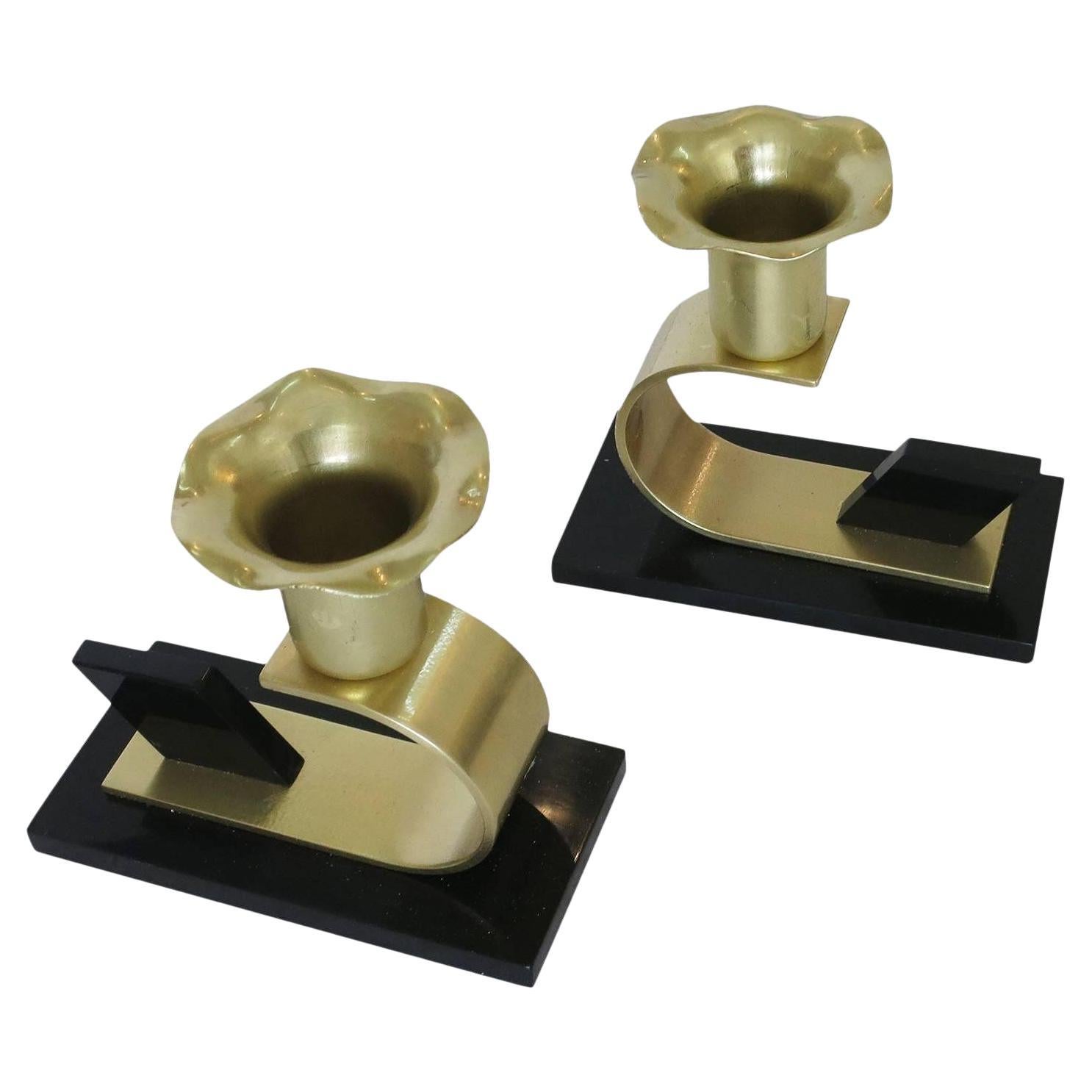 Brass and Bakelite Candlestick holders by Chase Brass - a Pair For Sale