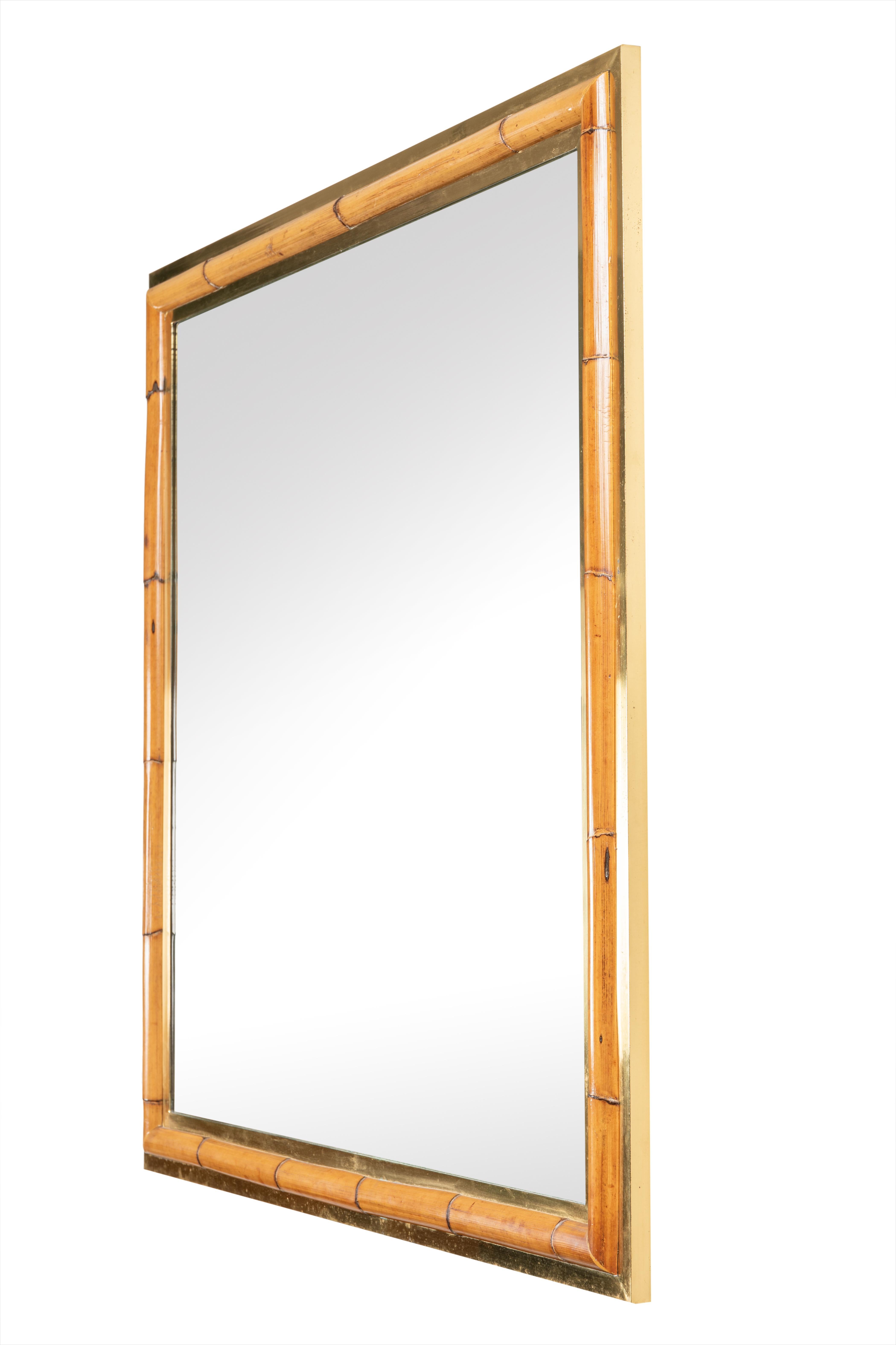 A square brass and bamboo framed mirror,
Italy, 1970s.

Measures: Height 39.4 in., 100 cm
Width 39.4 in., 100 cm
Depth 1.4 in., 3.5 cm