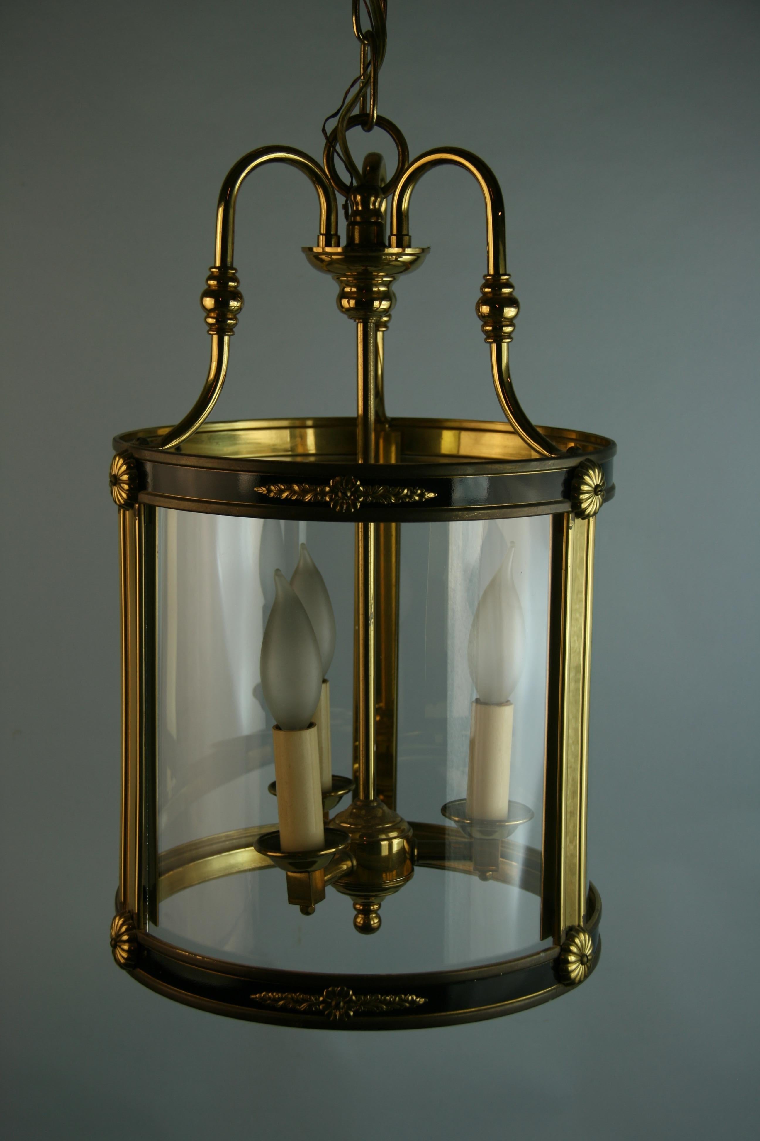 1249 Brass and glass federal style lantern
overall height with chain and canopy 28