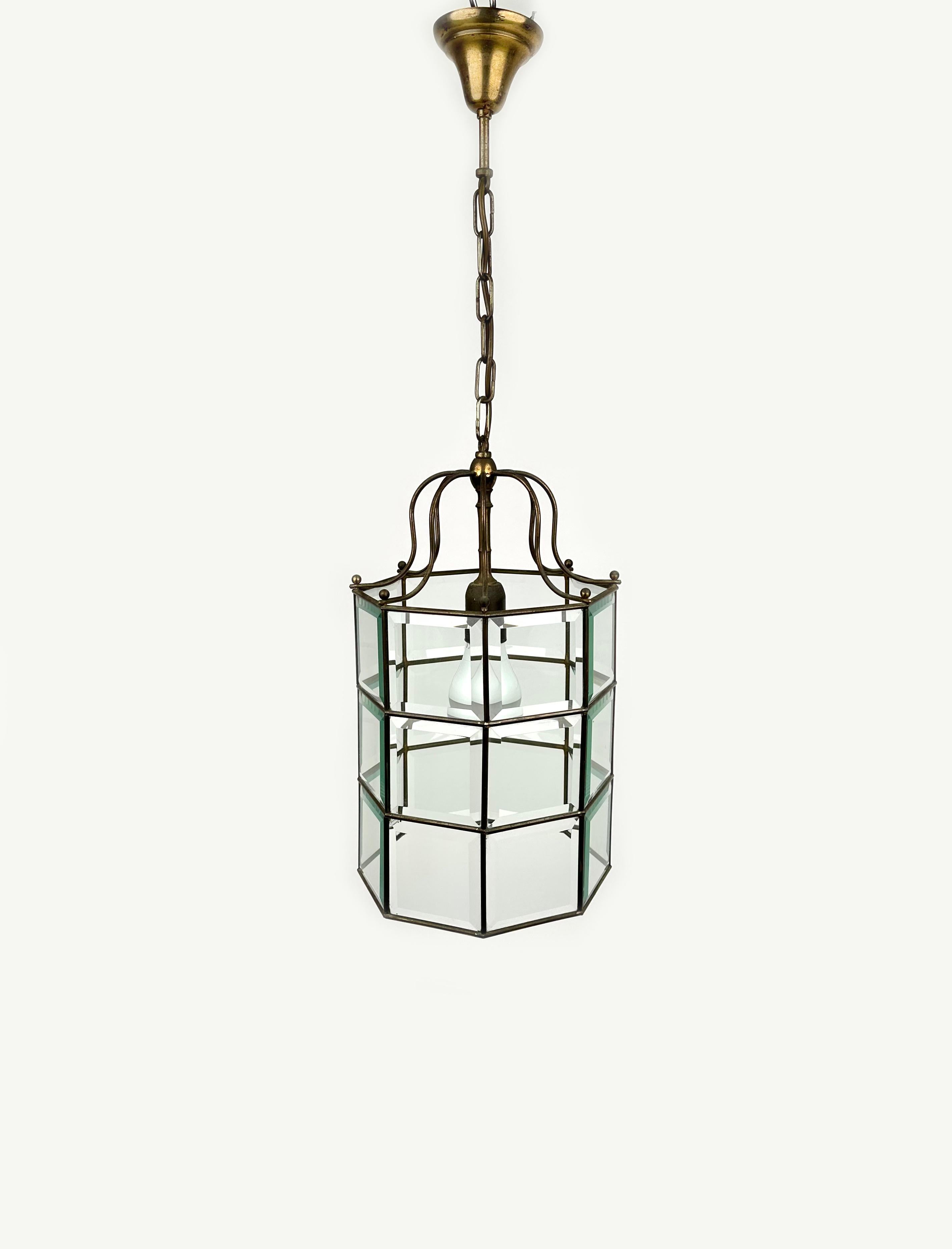 Chandelier Pendant Lantern in brass and beveled glass in the style of Adolf Loos. 

The stunning and clear cut pendant shows twentyfour facetted clear glasses in a brass frame. 

A unique light. 

Made in Italy in the 1950s. 

Measures: