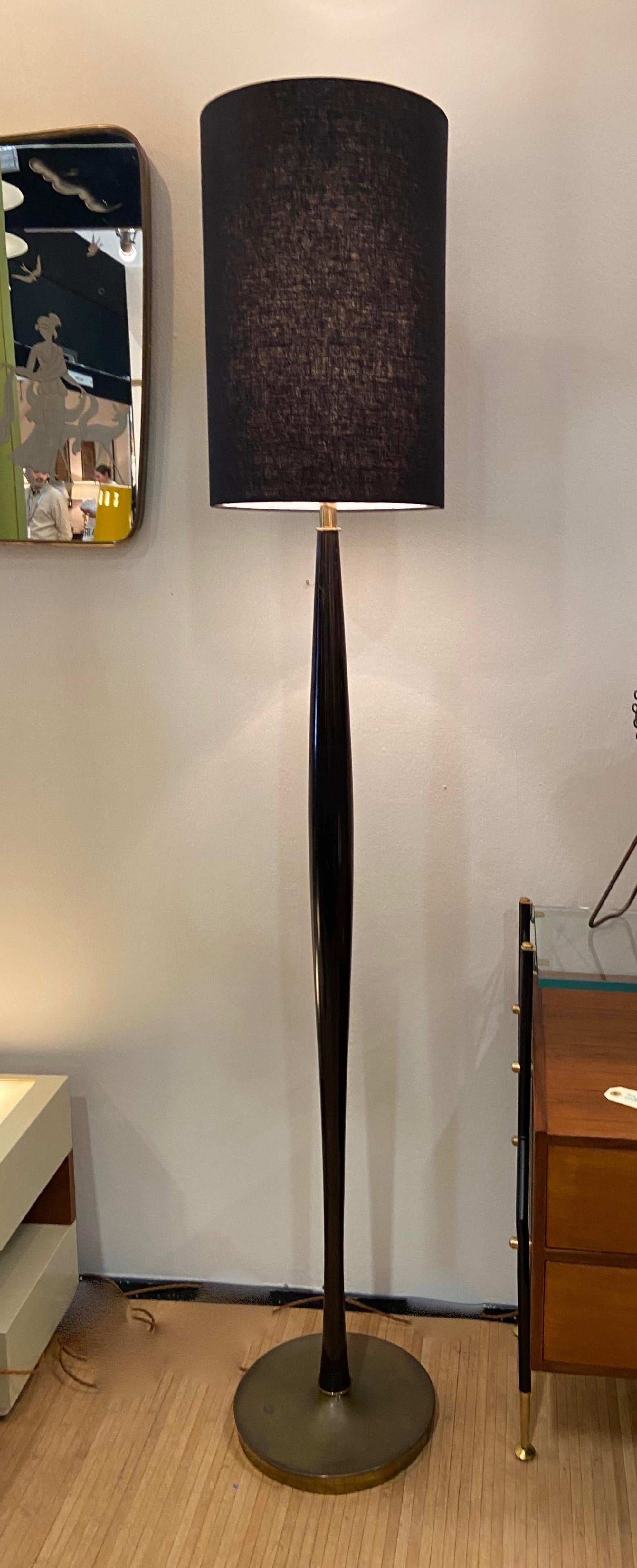 Superbly designed with beautiful shapes to the column as well as to the base.
The brass base has never been cleaned or polished.

Measures: 183cm high with the shade (6 ft. high)
156cm high without a shade (for shipping).