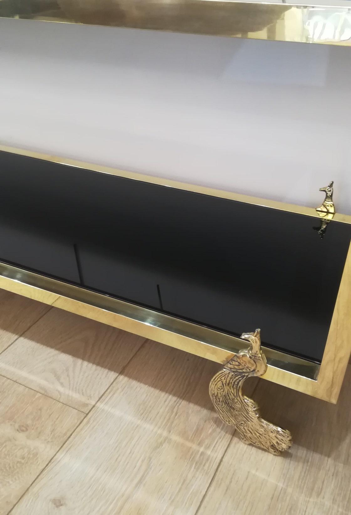 Brass and Black Glass Console, Feet Representing Peacocks For Sale 1