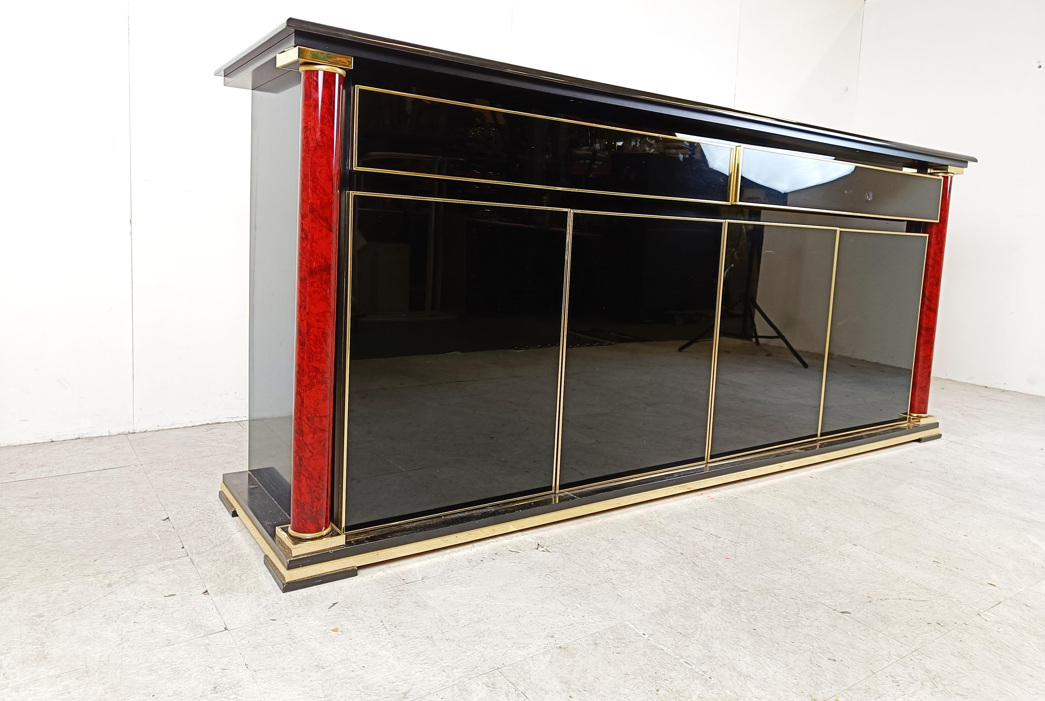 Hollywood Regency Brass and black lacquer sideboard, 1970s