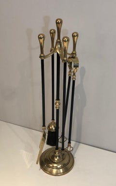 Brass and Black Lacquered Fireplace Tools on Stand. French. Circa 1970