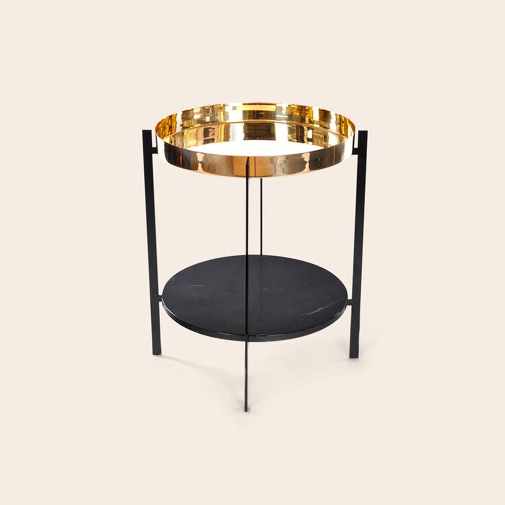 Brass and Black Marquina Marble Deck Table by OxDenmarq
Dimensions: D 57 x W 57 x H 67 cm
Materials: Steel, Black Marquina Marble, Brass
Also Available: Different tray conbinations available,

OX DENMARQ is a Danish design brand aspiring to