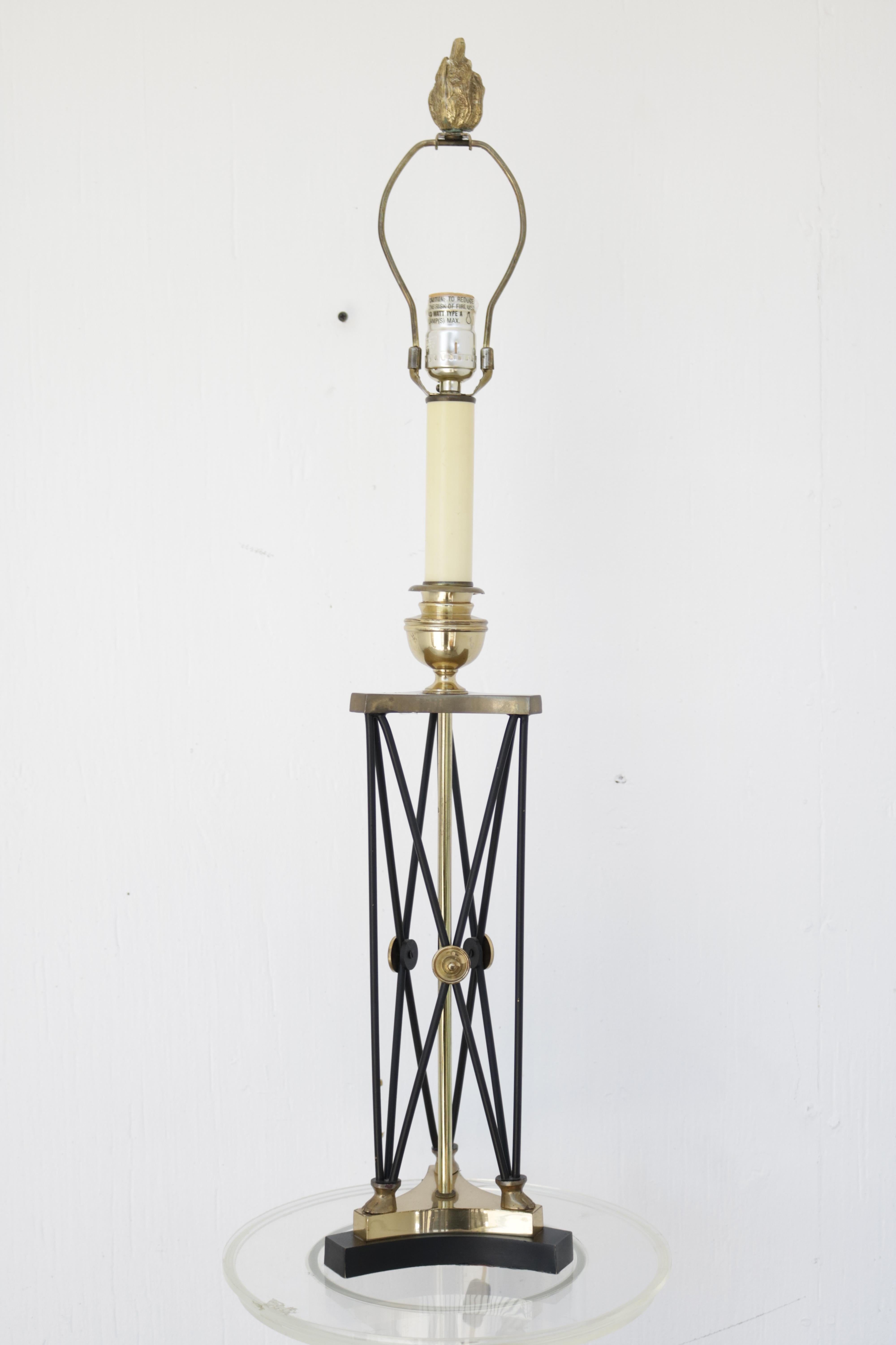 Table lamp with black steel cross hatch design on the base and brass accents. Total height with shade: 30