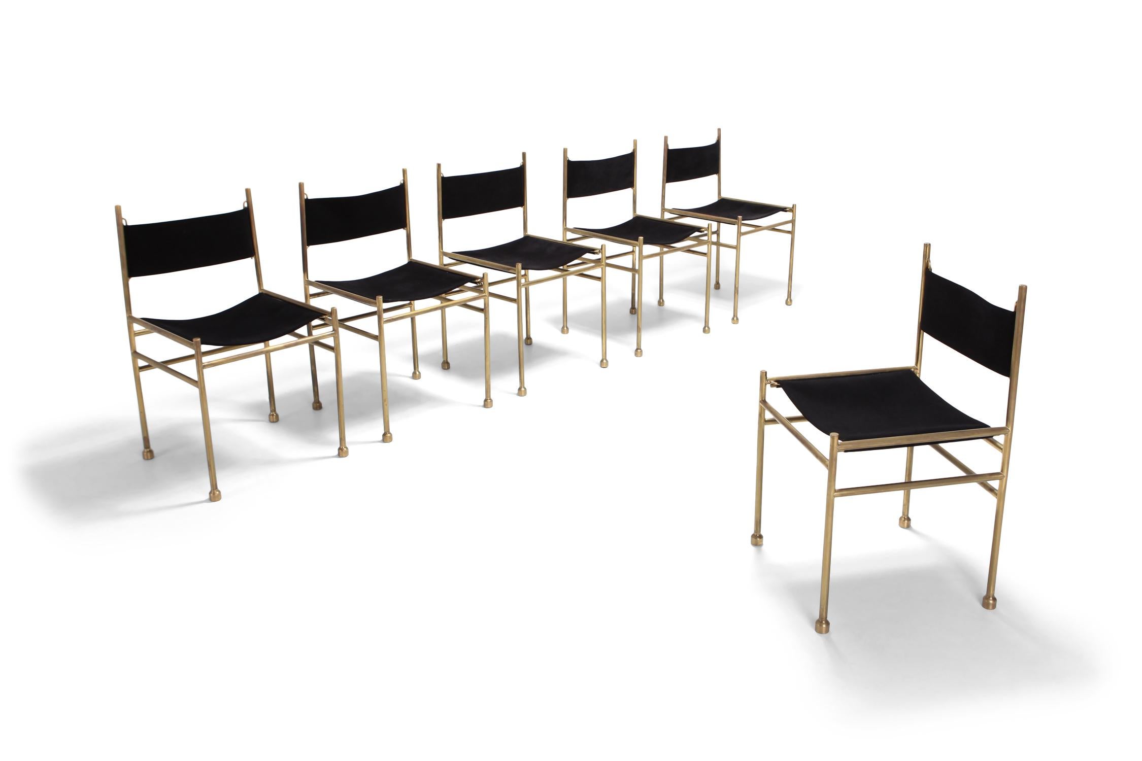 Hollywood Regency dining chairs in solid brass and with velvet seating by Luciano Frigerio, set of six.


Frequent visits to prestigious craftsmen’s studios like Canturine, where he often met Masters like Gio' Ponti, Franco Albini, Carlo de Carli