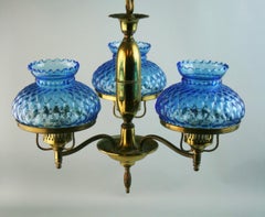 Brass and Blue Hurricane Glass Chandelier