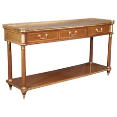 Tavolo consolle in ottone e bronzo Maison Jansen a due livelli del Direttorio francese