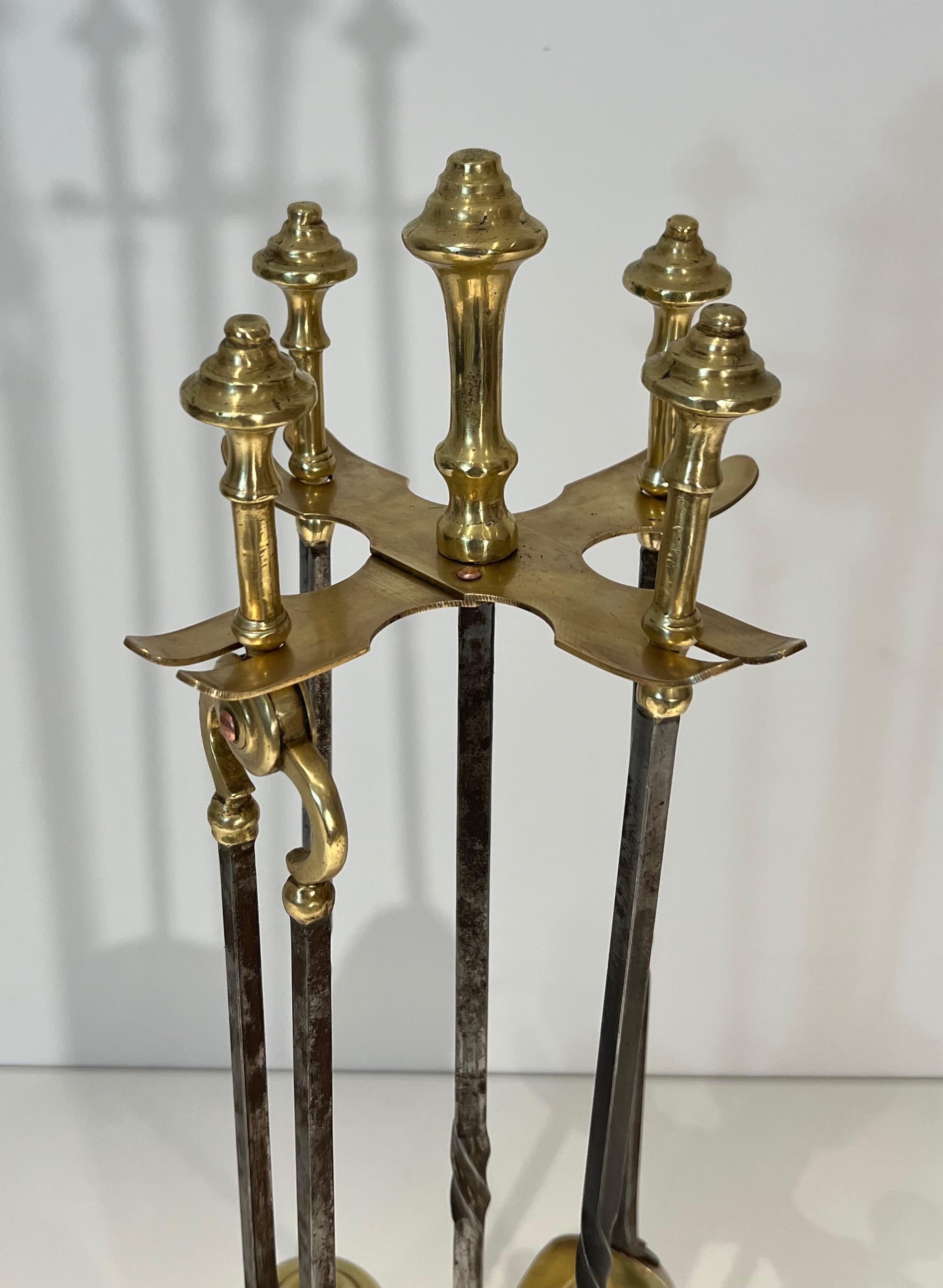 French Brass and Brushed steel Fireplace Tools Attributed to Maison Jansen For Sale