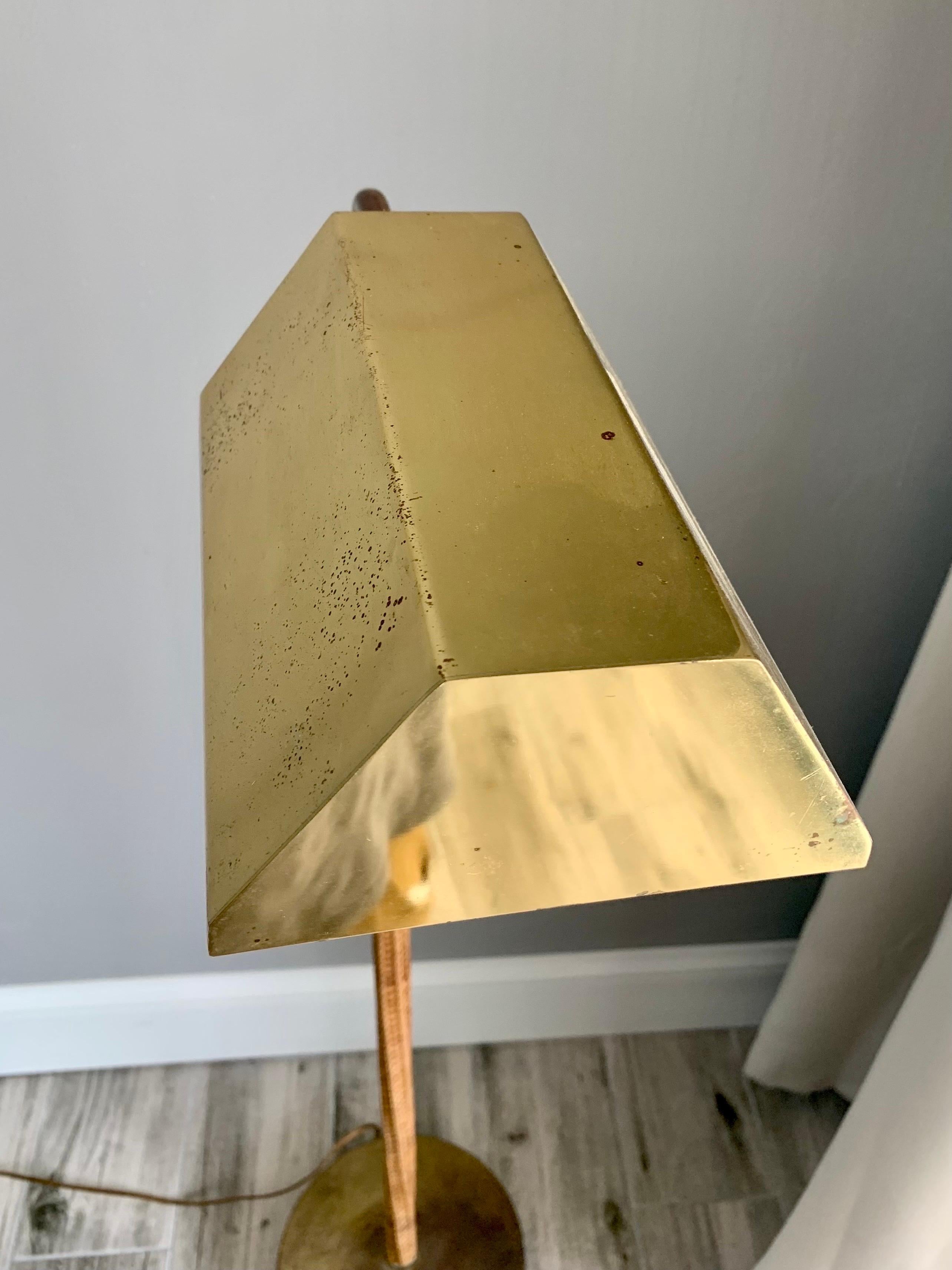 Brass and Cane Wrapped Floor Lamp After Paavo Tynell, circa 1950s In Good Condition For Sale In Boynton Beach, FL