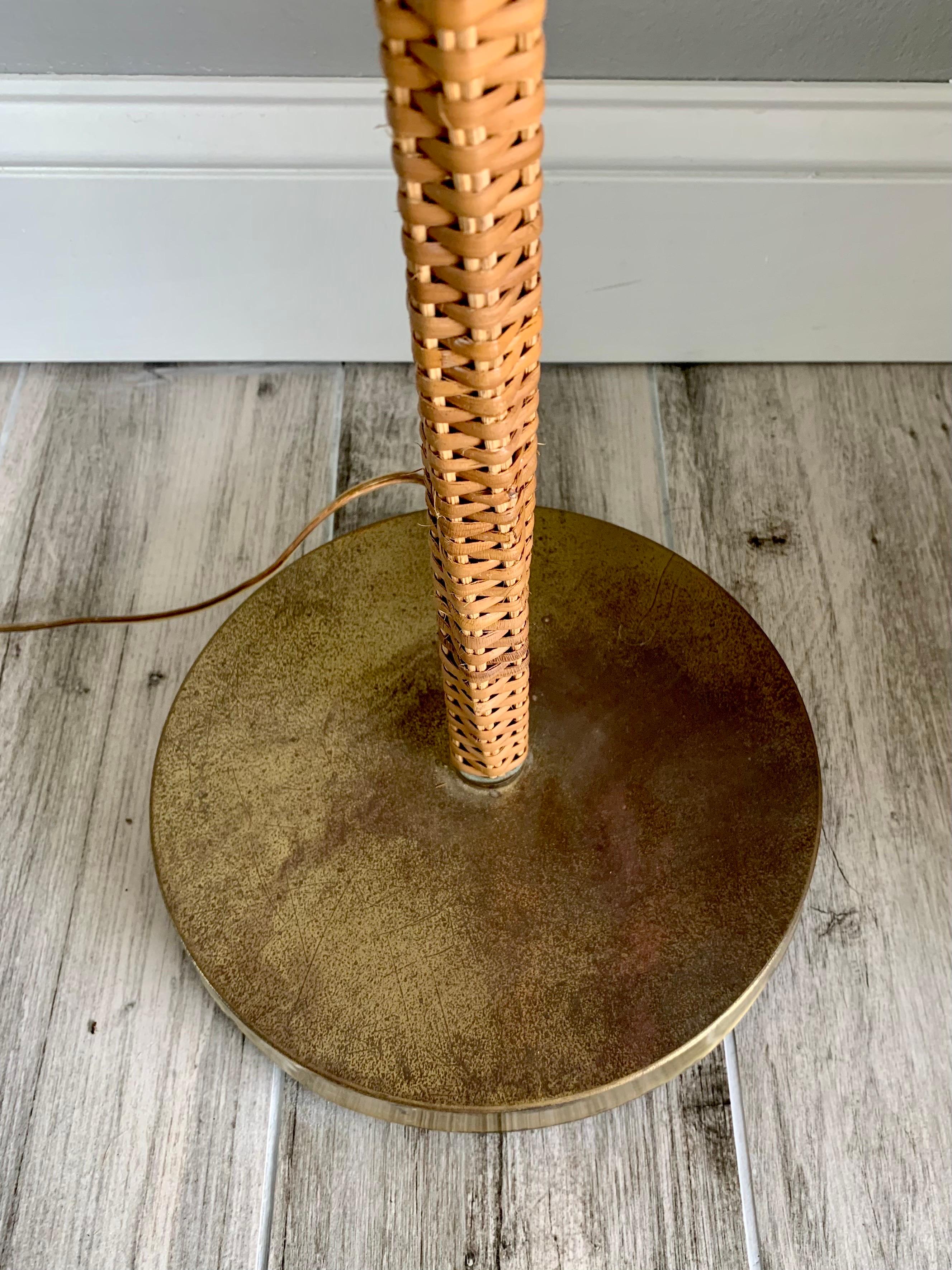 20th Century Brass and Cane Wrapped Floor Lamp After Paavo Tynell, circa 1950s For Sale