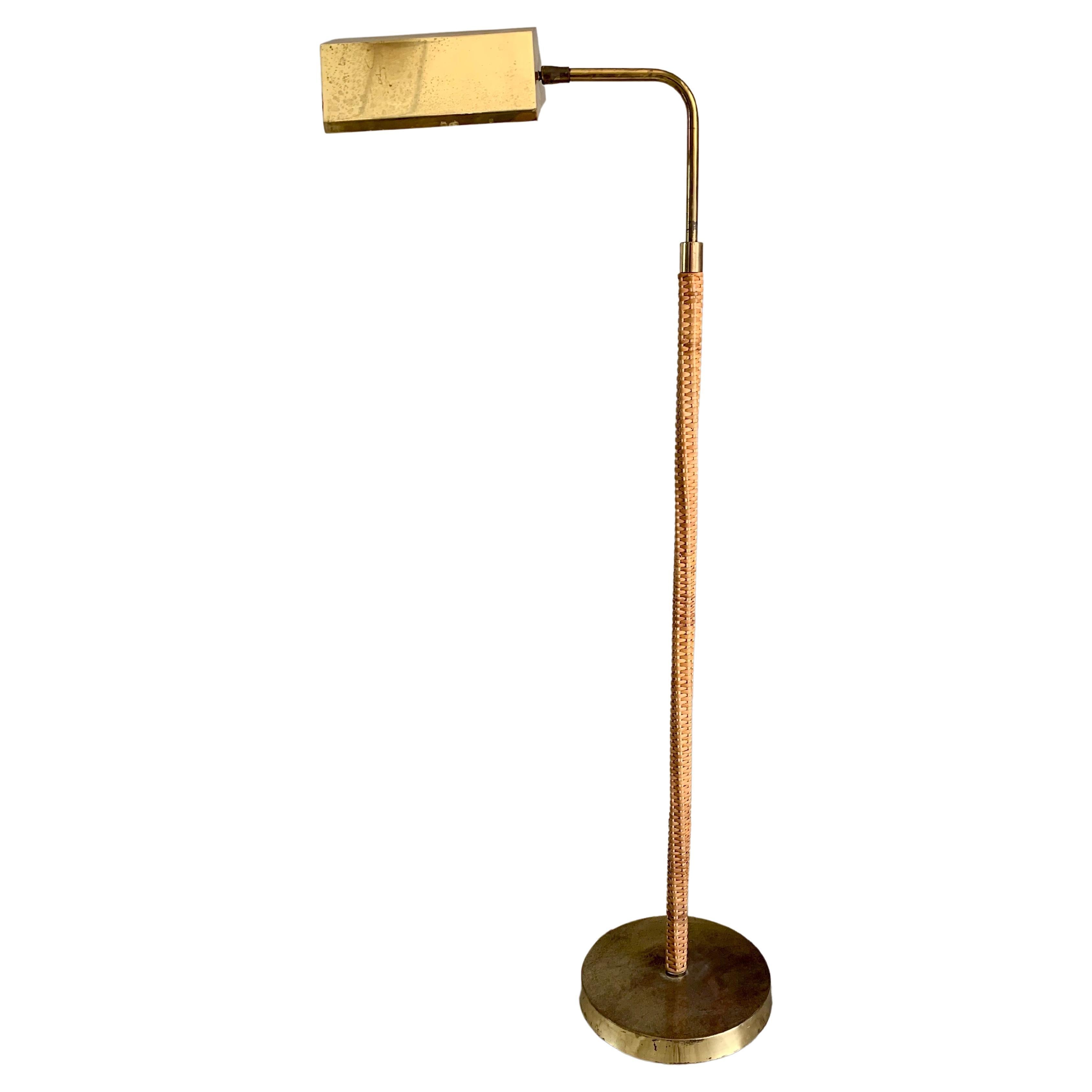 Brass and Cane Wrapped Floor Lamp After Paavo Tynell, circa 1950s For Sale