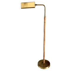 Vintage Brass and Cane Wrapped Floor Lamp After Paavo Tynell, circa 1950s