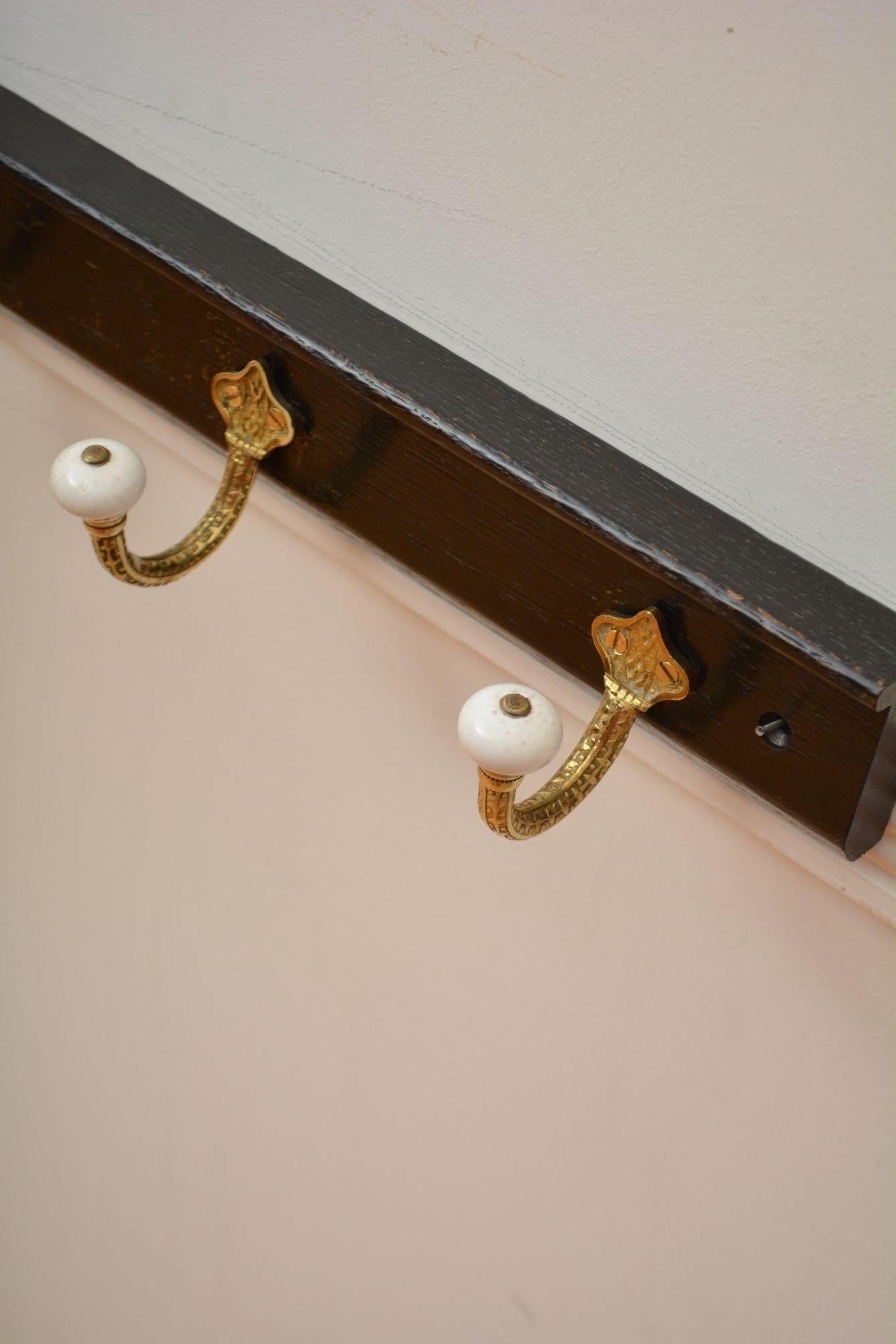 Brass and Ceramic Coat Hooks on Oak backing Coat Rack For Sale 2