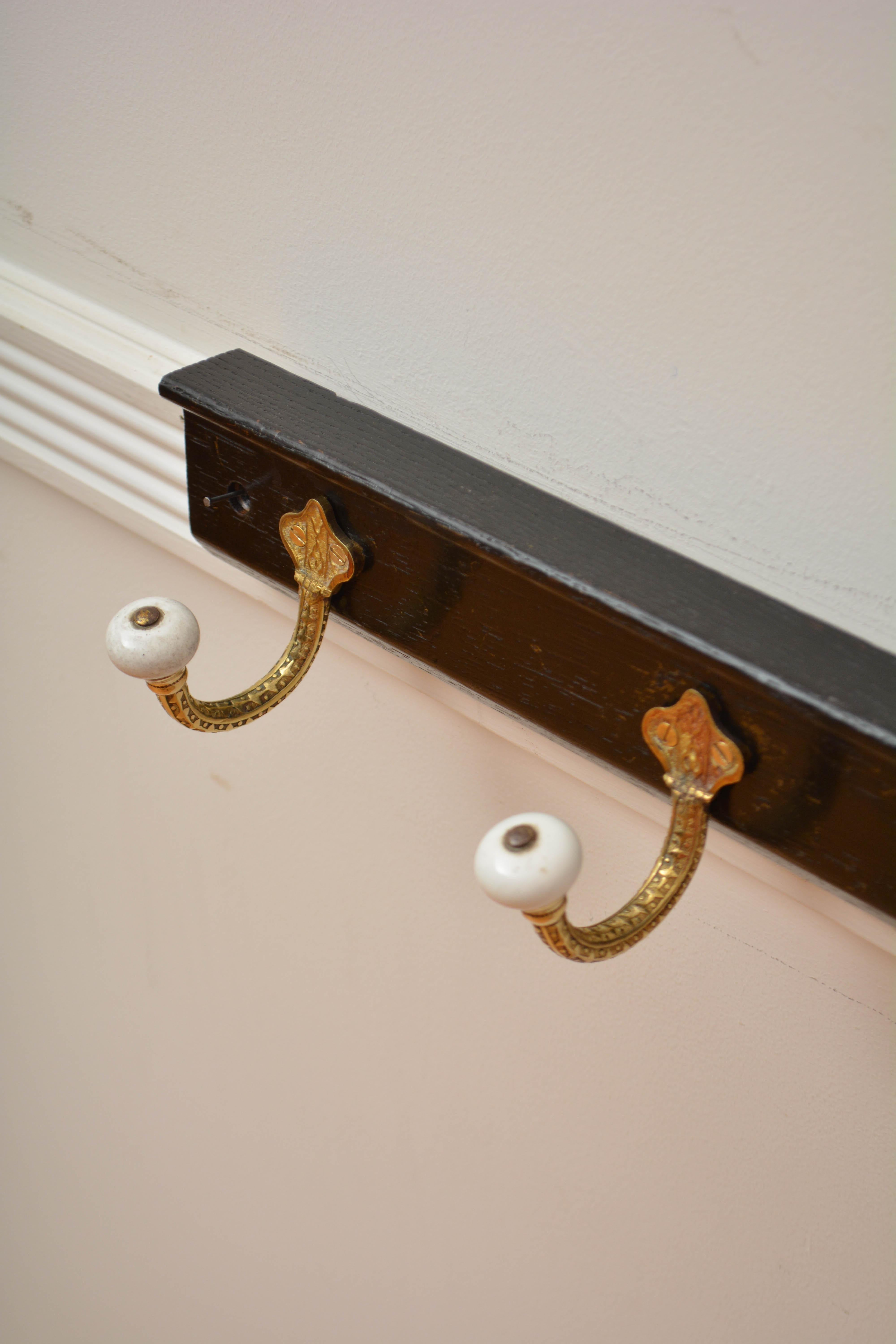 Brass and Ceramic Coat Hooks on Oak Ebonised Backing Coat Rack In Good Condition For Sale In High Peak, GB
