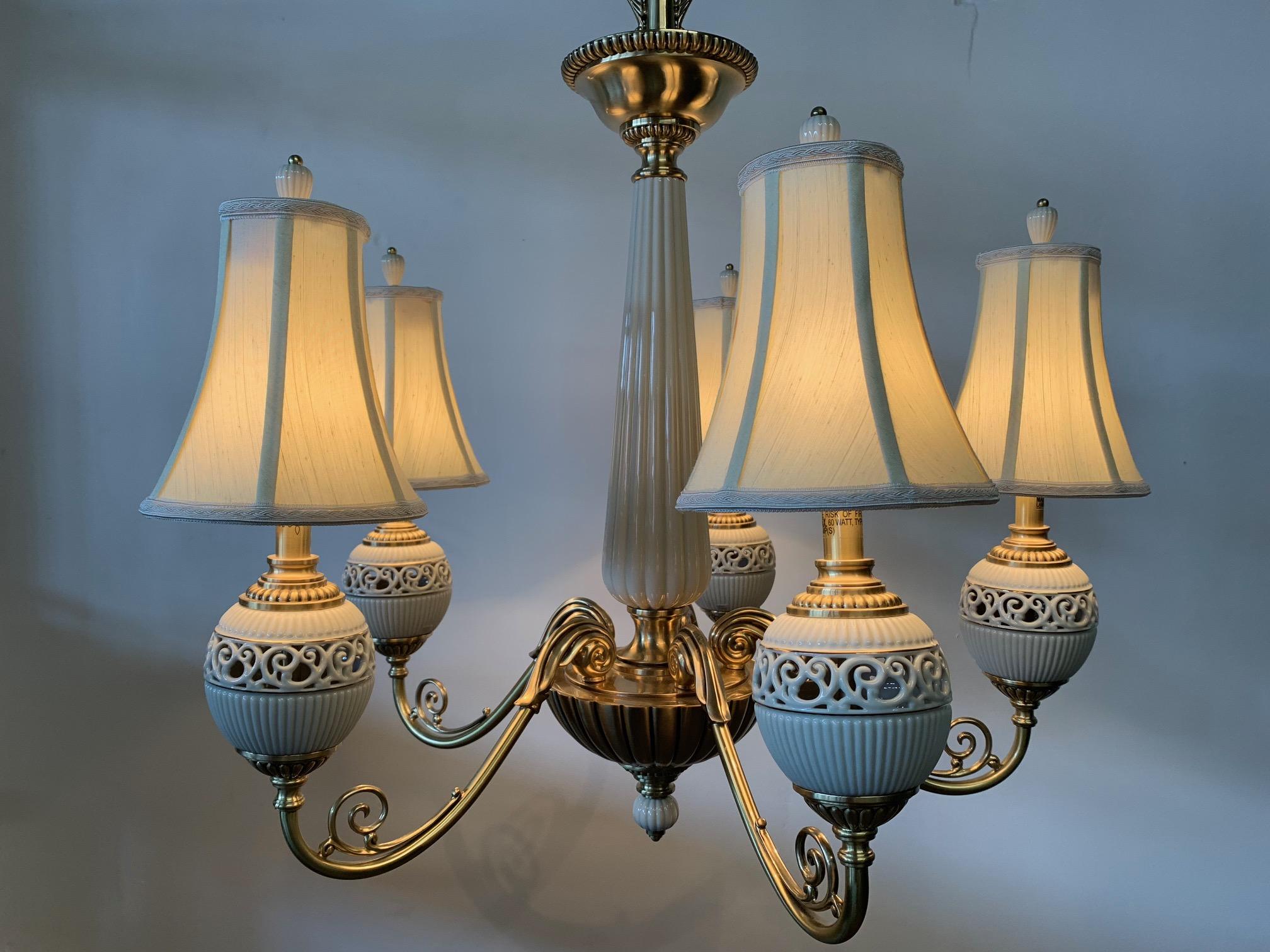 5-light chandelier by Lenox features solid brass with ceramic accents and sculptural shades. Excellent condition with only one minor abrasion that is unseen when hanging (see last photo).