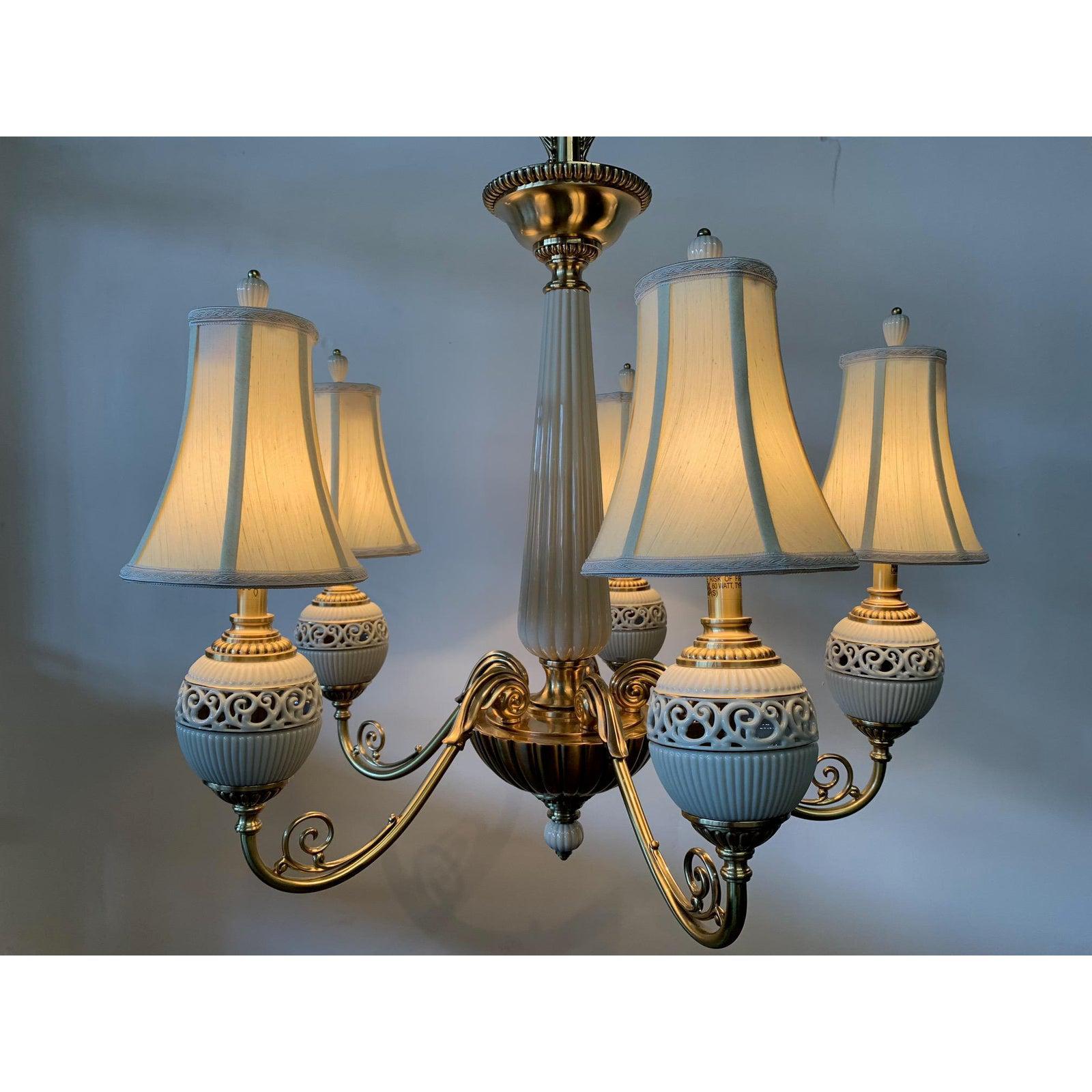 5-light chandelier by Lenox features solid brass with ceramic accents and sculptural shades. Excellent condition with only one minor abrasion that is unseen when hanging (see last photo). 
       