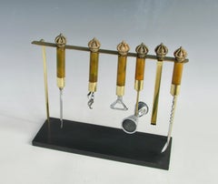 Brass and chrome bar tools with Bakelite handles on stand fit for a king
