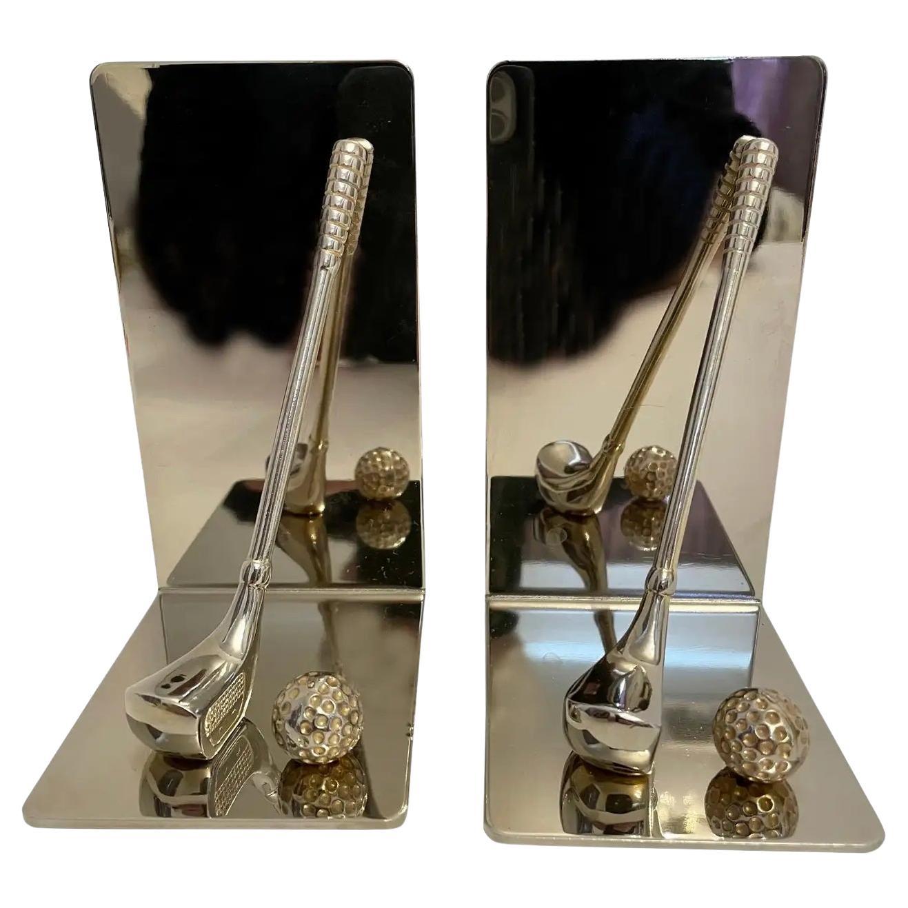 Set of brass and chrome golf bookends featuring brass club and ball with nice detail. Thin foam on bottom to prevent scratching. Great for the golfer or man cave or she shed. Very good overall condition. QUICK SHIP