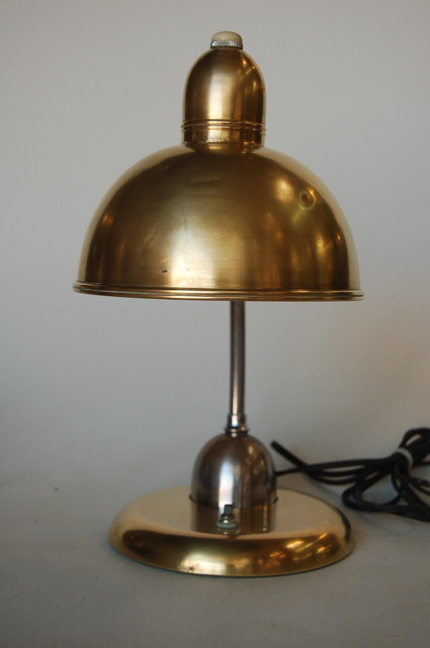 Machine Age brass and chrome bell shaped reading desk lamp. Measures: 13