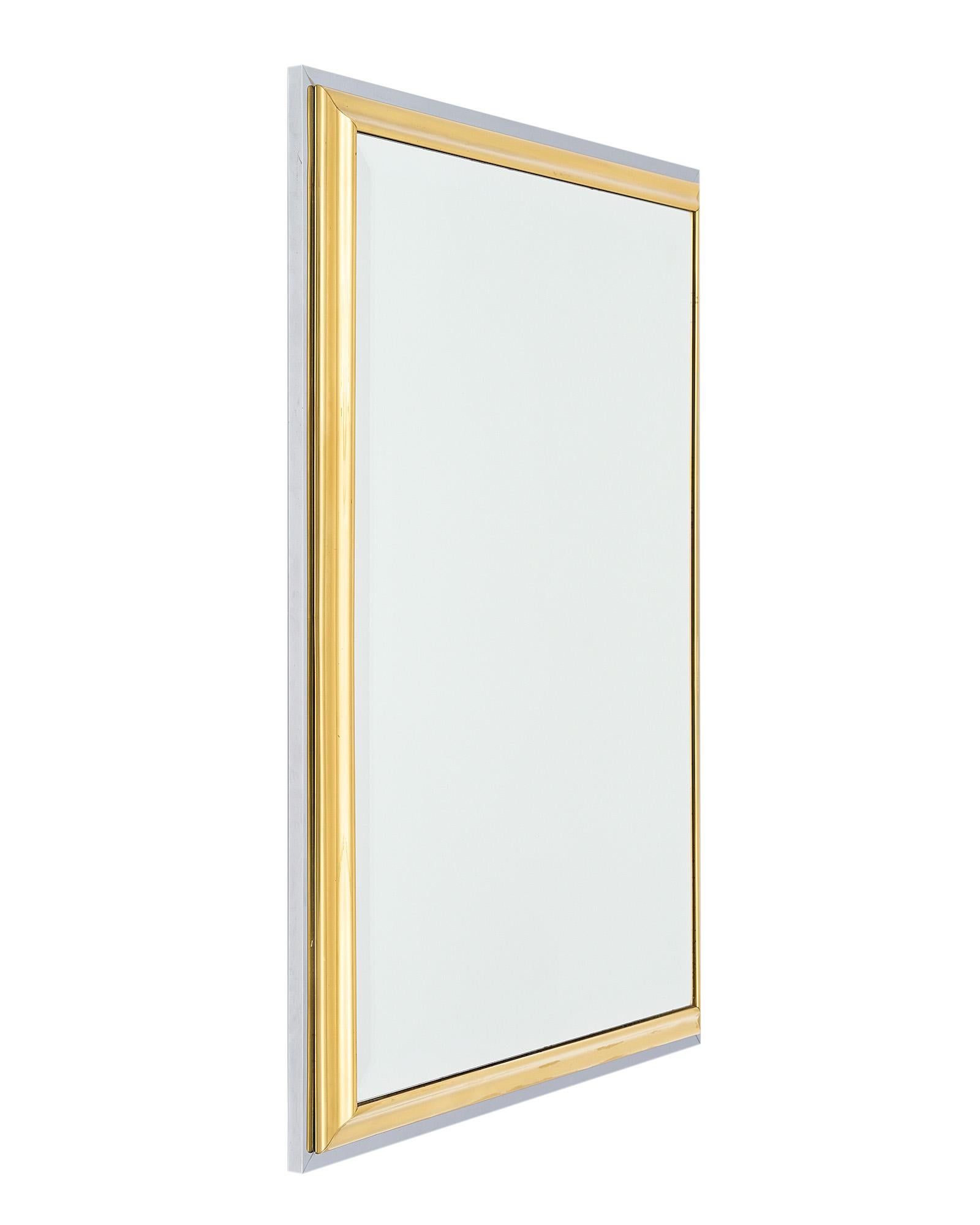 Mirror, French, in the Modernist style, of brass and chromed metal.