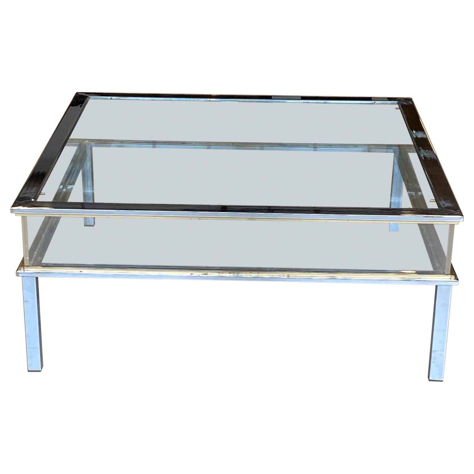 Vintage chrome and brass sliding top cocktail table by Maison Jansen, circa 1970s.
