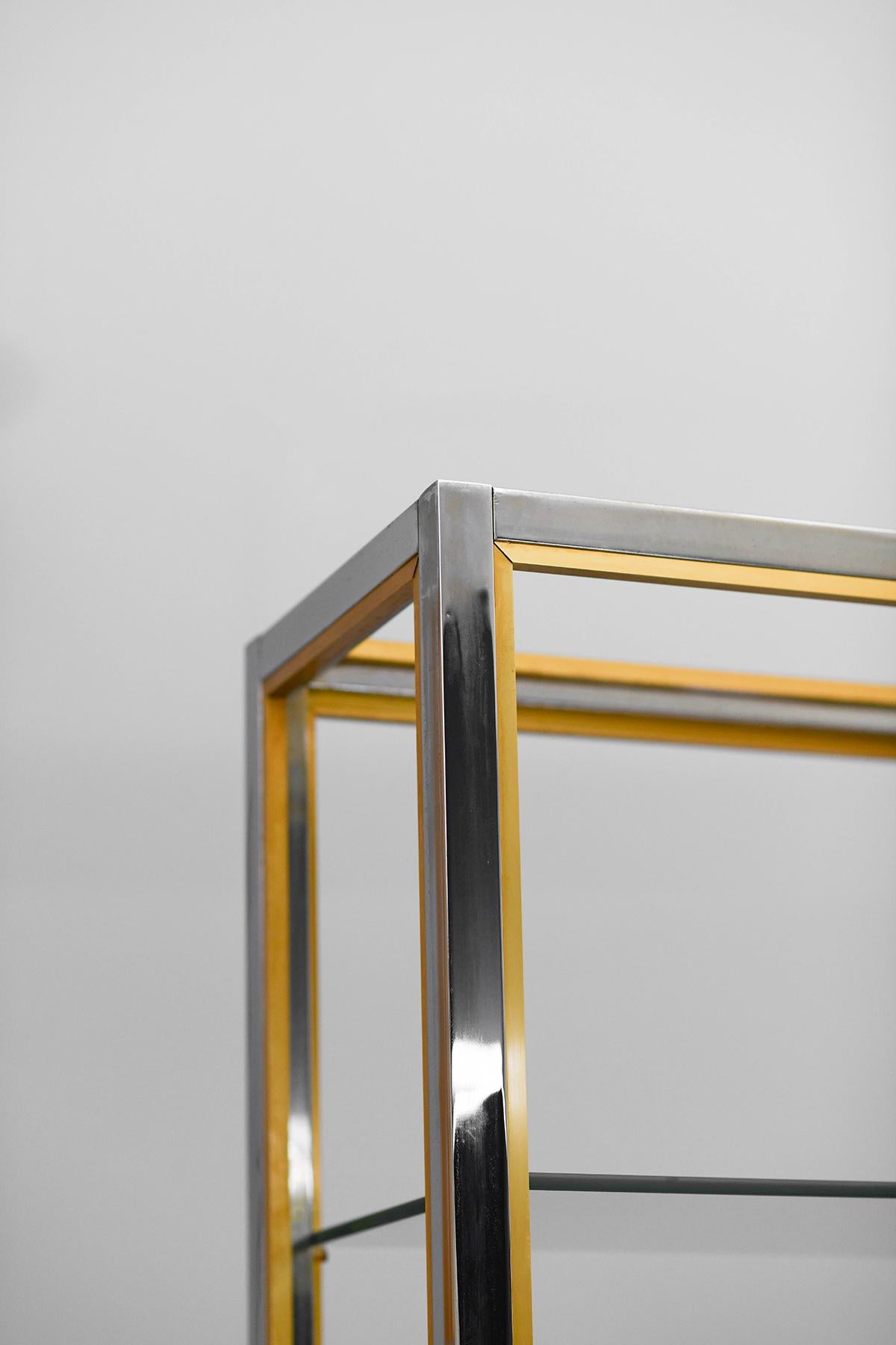 Italian Brass and chromed metal bookcase with glass shelves, Italy 1980