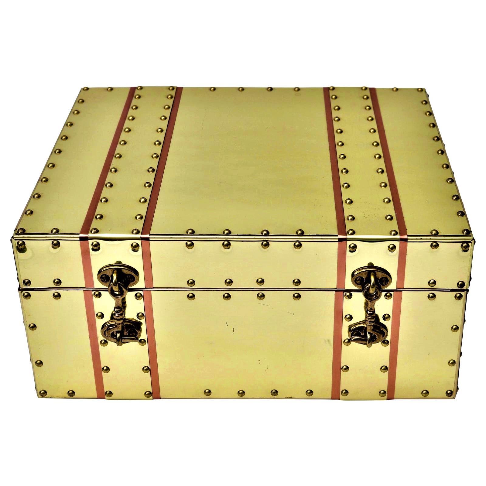 This handsome storage box is very much in the style of pieces created by Sarreid in the 1970s. The interior has a paper lining.

Note: This piece has been professionally polished and clear lacquered.

For best net trade price or additional