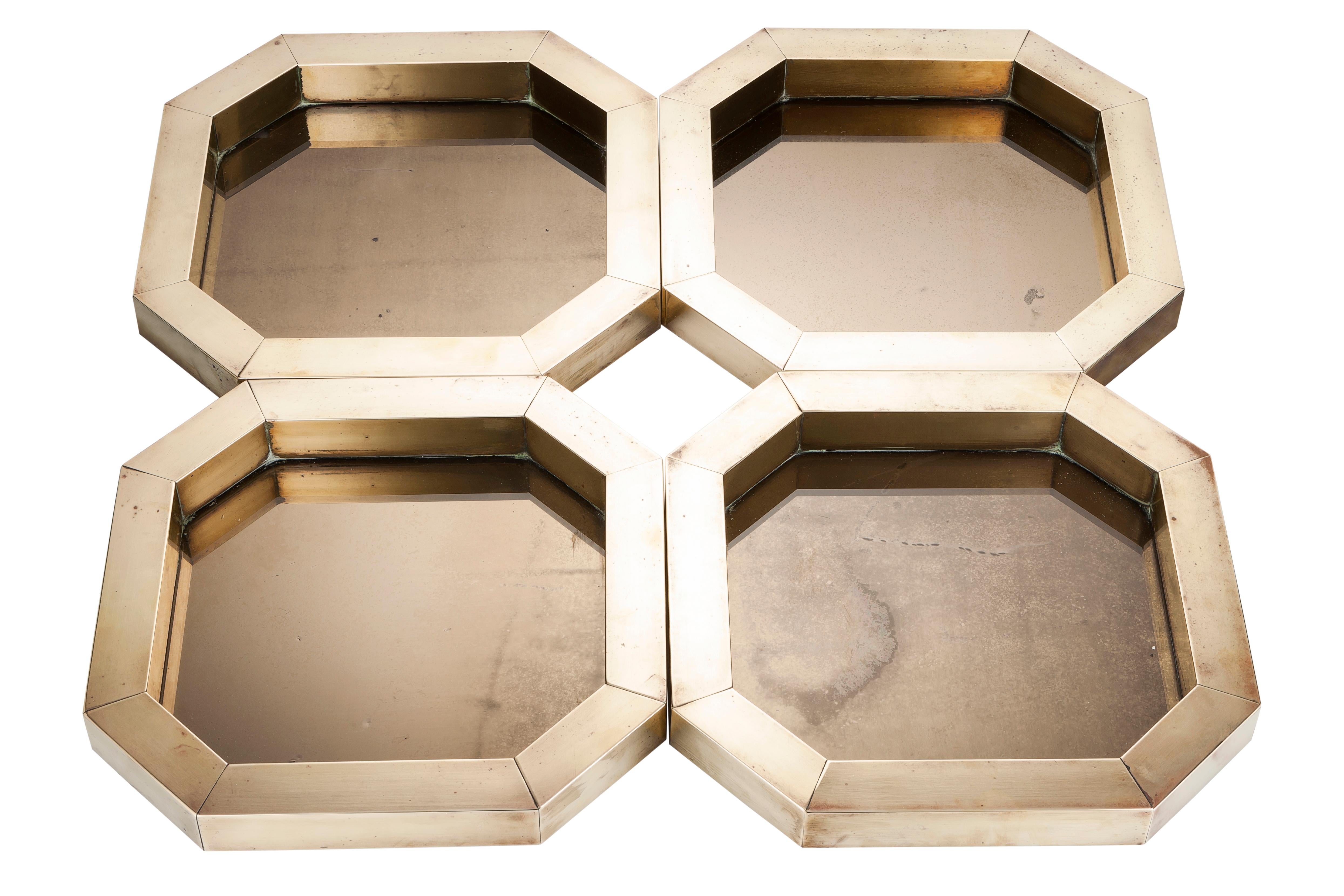 Hexagonal trinket trays, with brass frames and copper mirrored surface areas, designed by Hartwig Bullerdieck for hotel magnate Sol Kerzner for his Sun City project in 1979. Manufactured by Design Benedict.