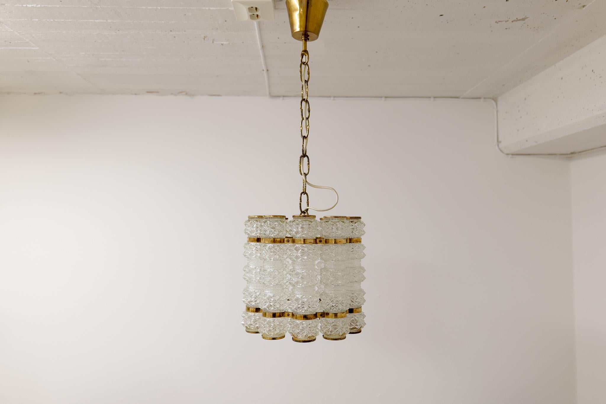 Scandinavian Modern Brass and Crystal Cylinder Chandelier by Tyringe for Orrefors, Sweden For Sale