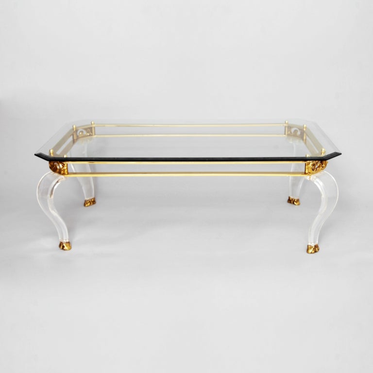 Brass and Curved Lucite Legs Coffee Table with Glass Top, Hollywood