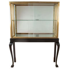 Brass and Ebonized Display Cocktail Cabinet
