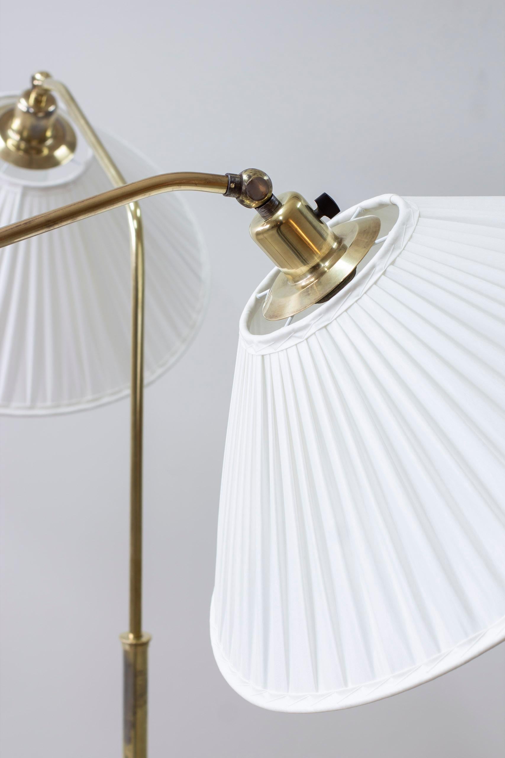 Brass and fabric floor lamps by Harald Elof Notini, Böhlmarks, 1940s For Sale 1