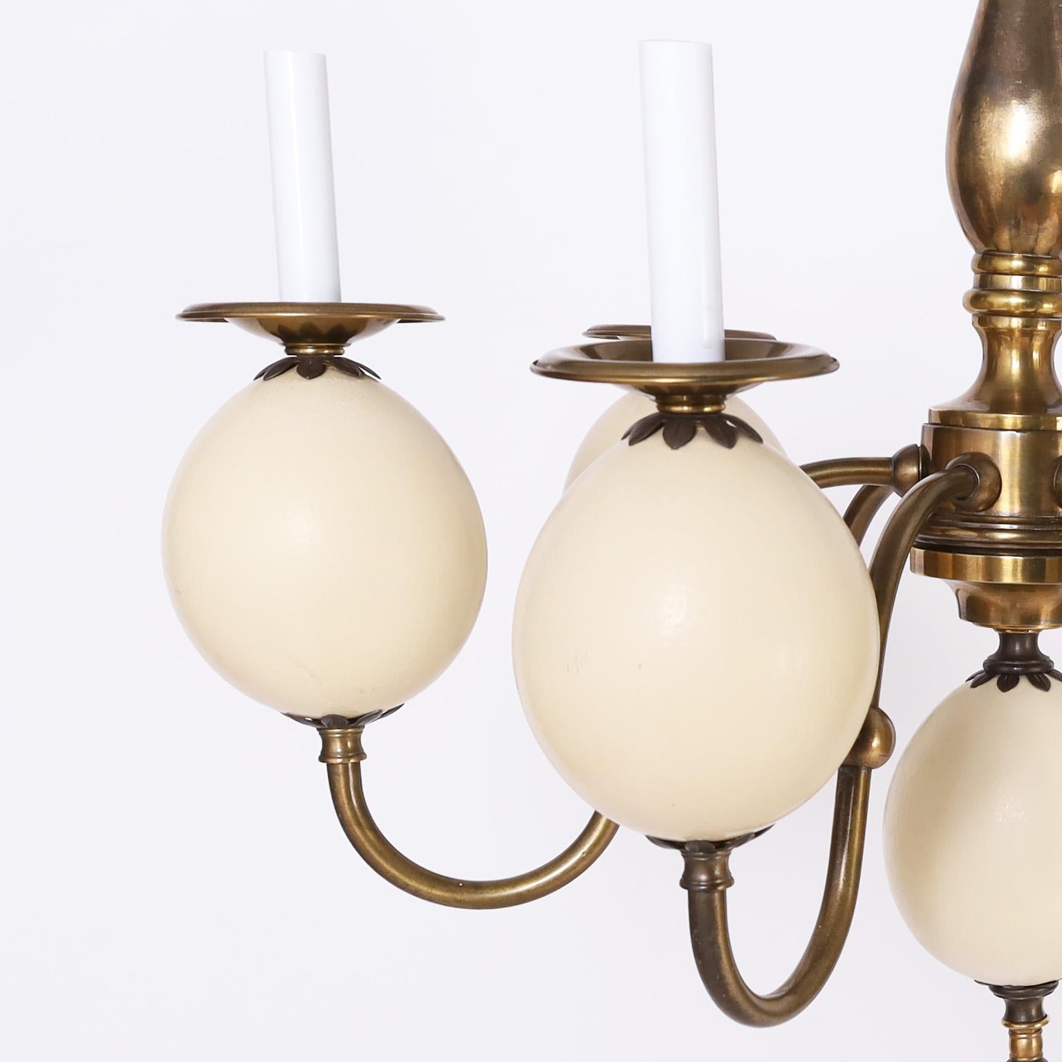 Polished Brass and Faux Ostrich Egg Chandelier For Sale