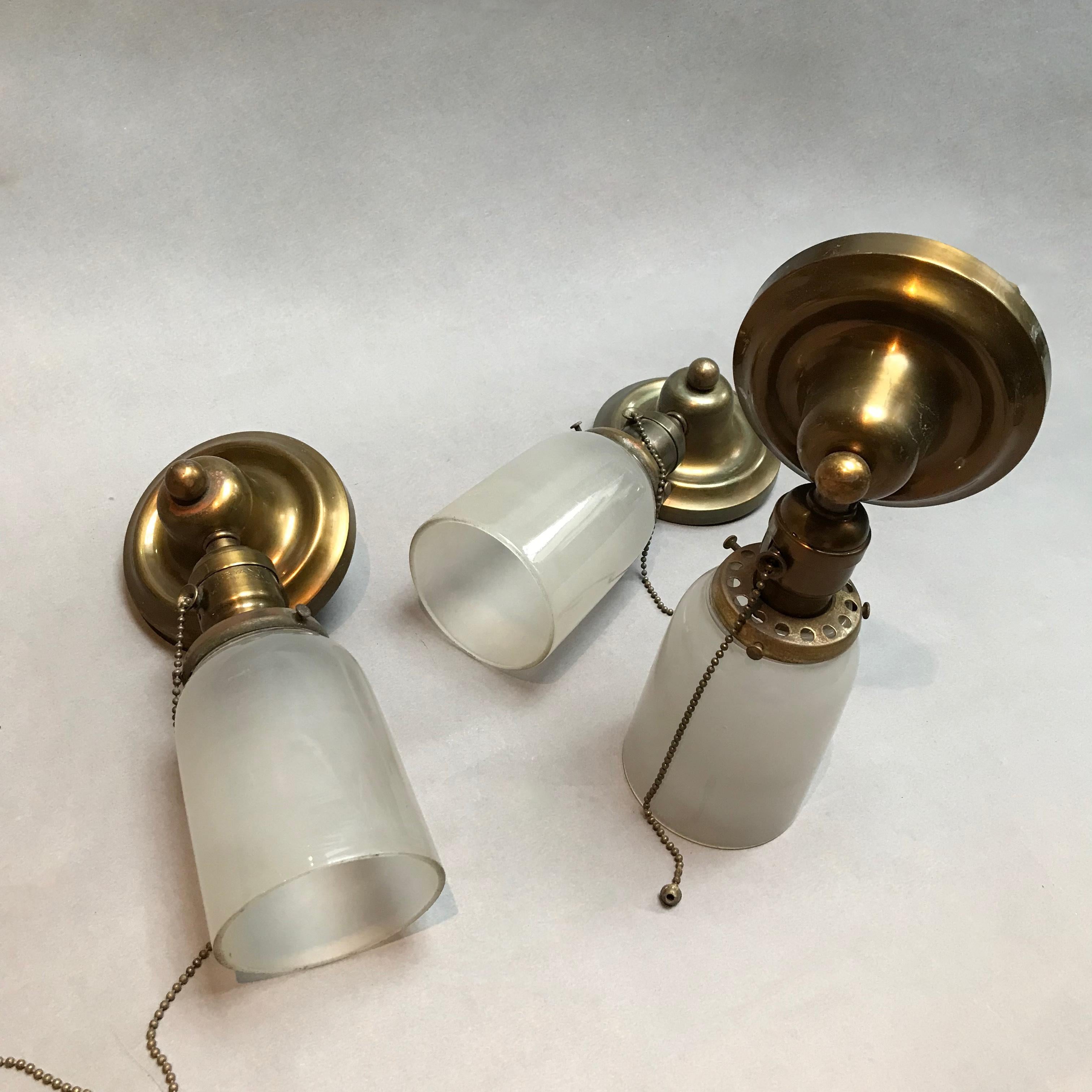 Brass and Frosted Glass Wall Sconce Lights In Good Condition In Brooklyn, NY
