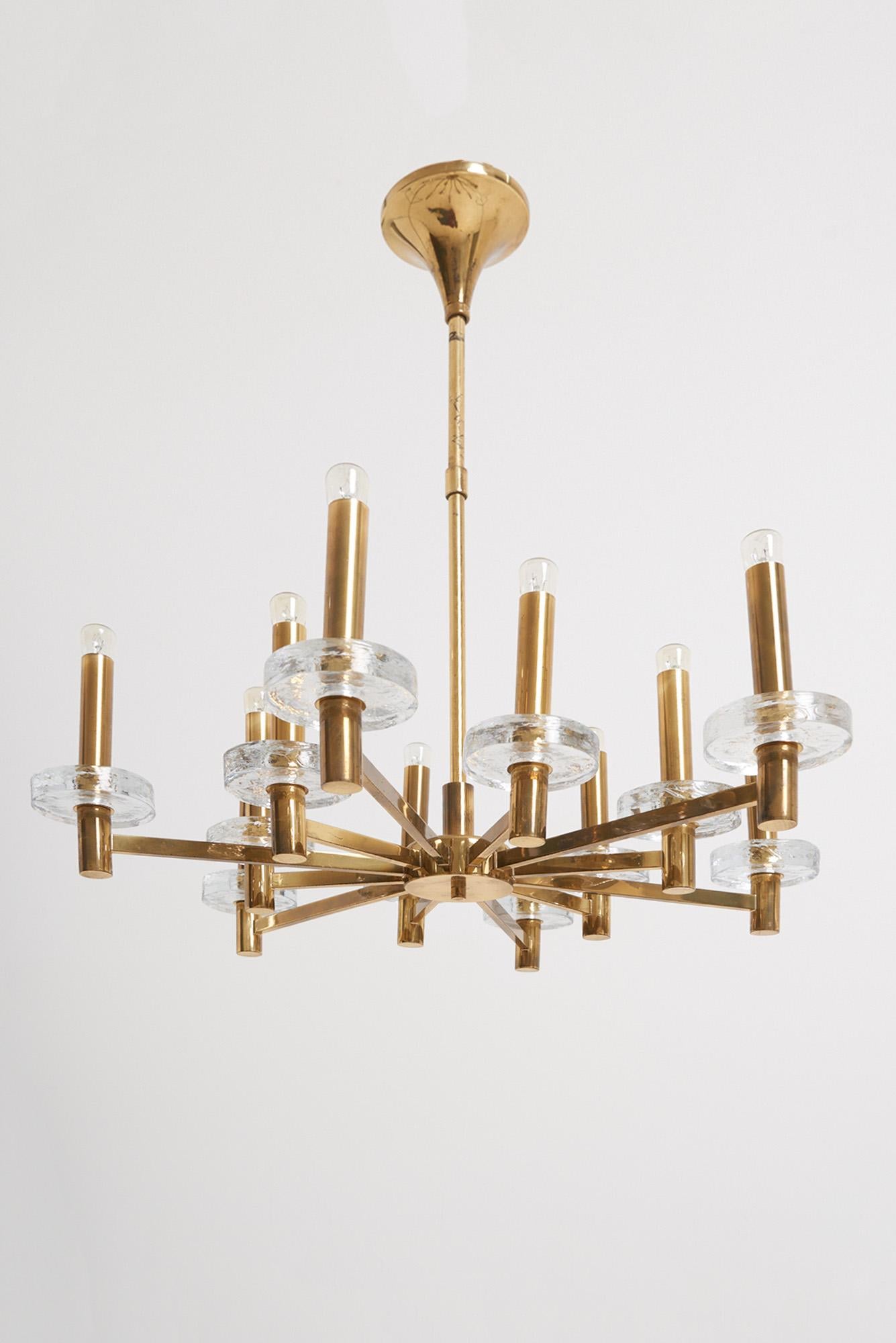 A 12-light brass and glass ceiling light by Gaetano Sciolari
Italy, mid 20th Century
68 cm high by 64 cm diameter