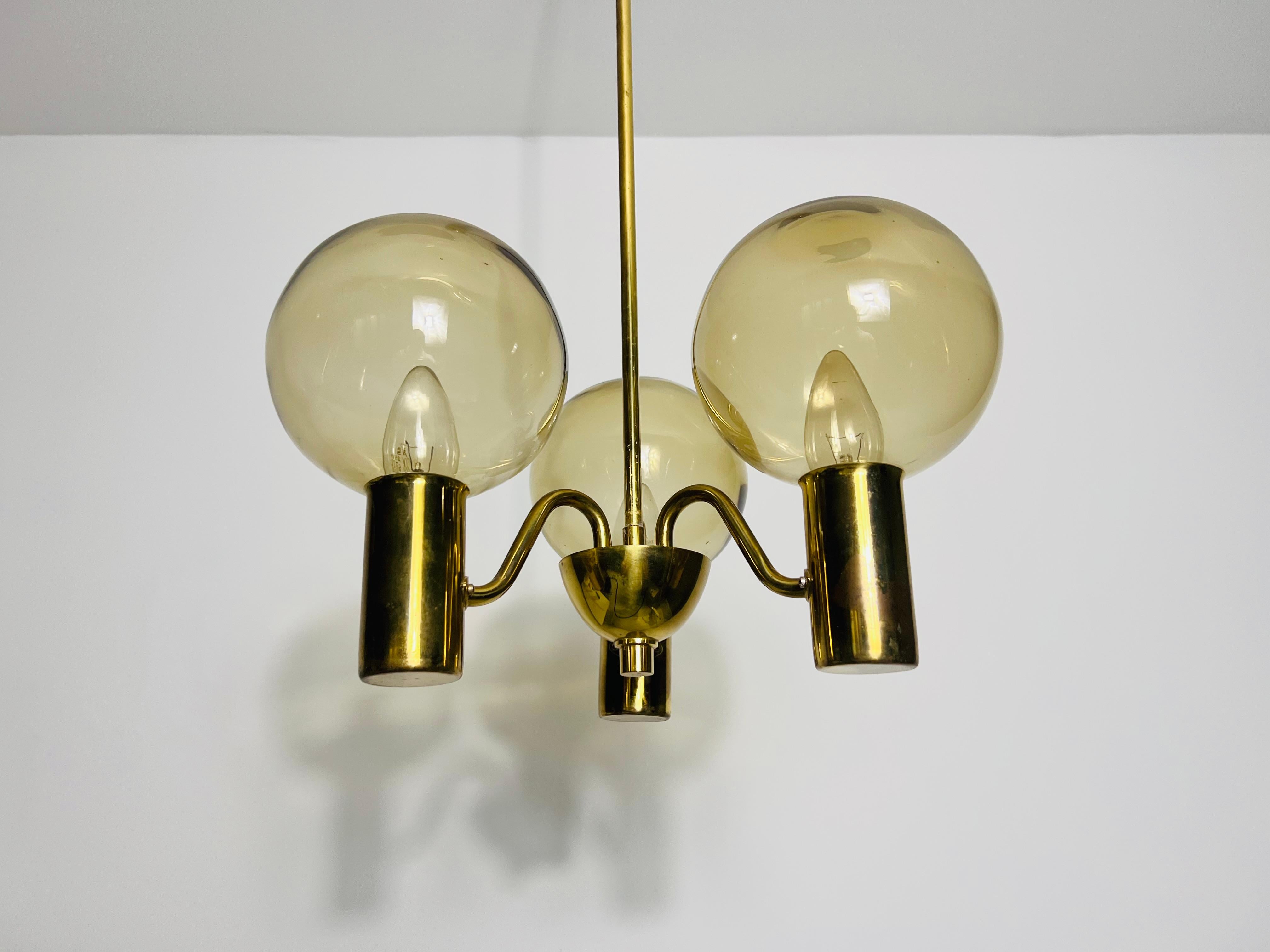 Swedish Brass and Glass Chandelier by Hans-Agne Jakobsson, Sweden, 1960s For Sale