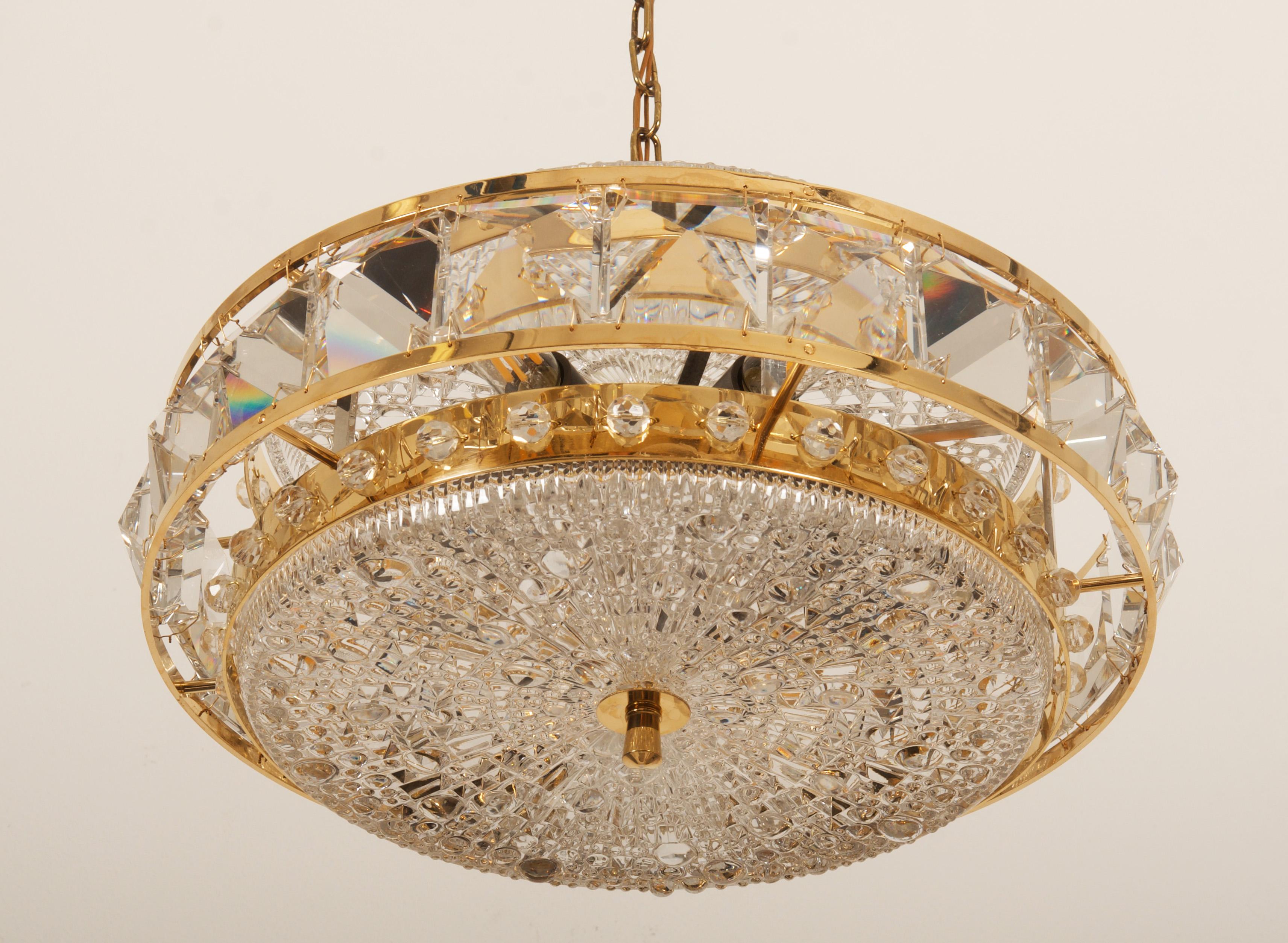 Scandinavian Modern Brass and Glass Chandelier by Orrefors from the 1960s For Sale