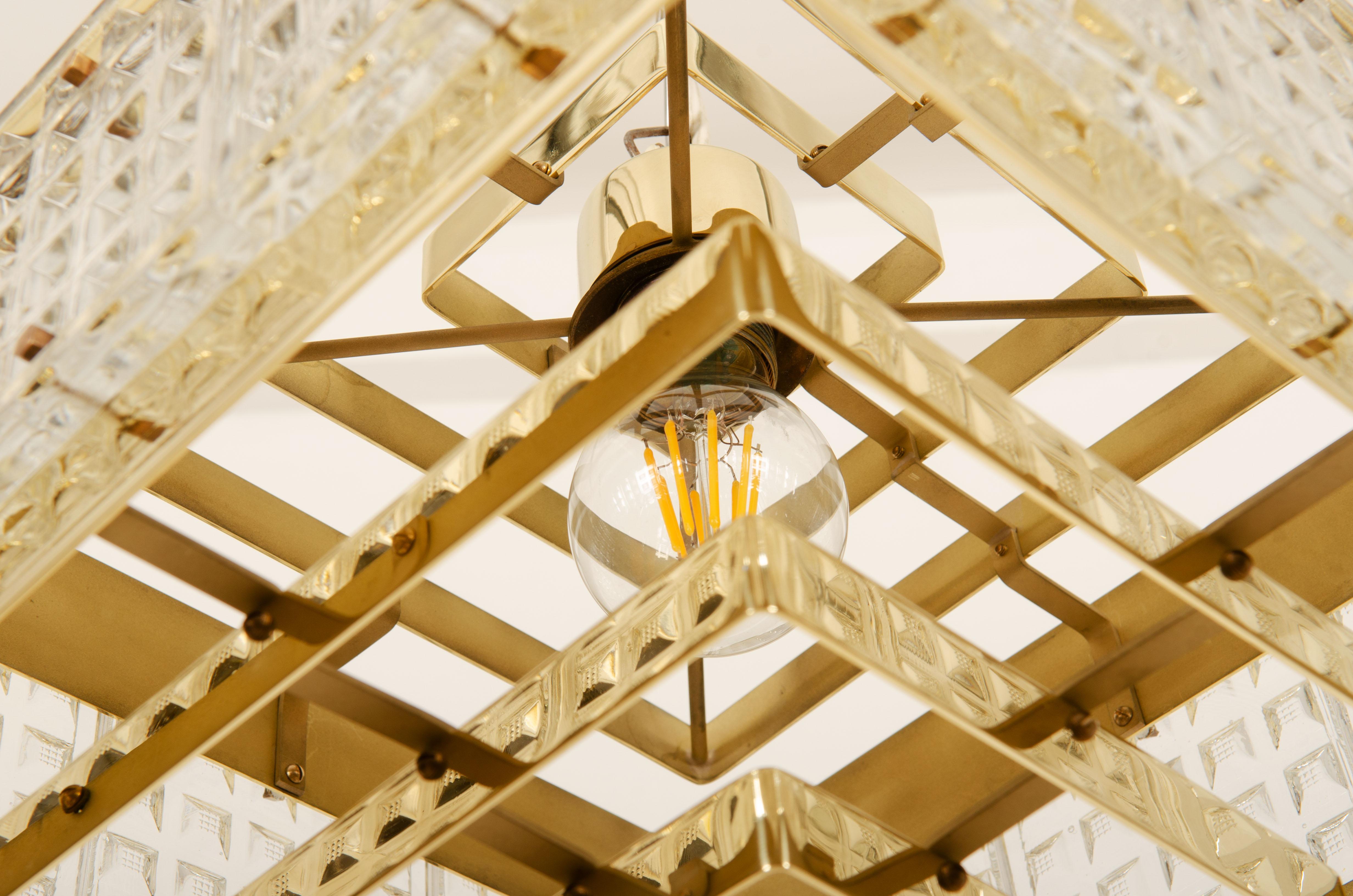 Pressed Brass and Glass Chandelier by Orrefors from the 1960s For Sale