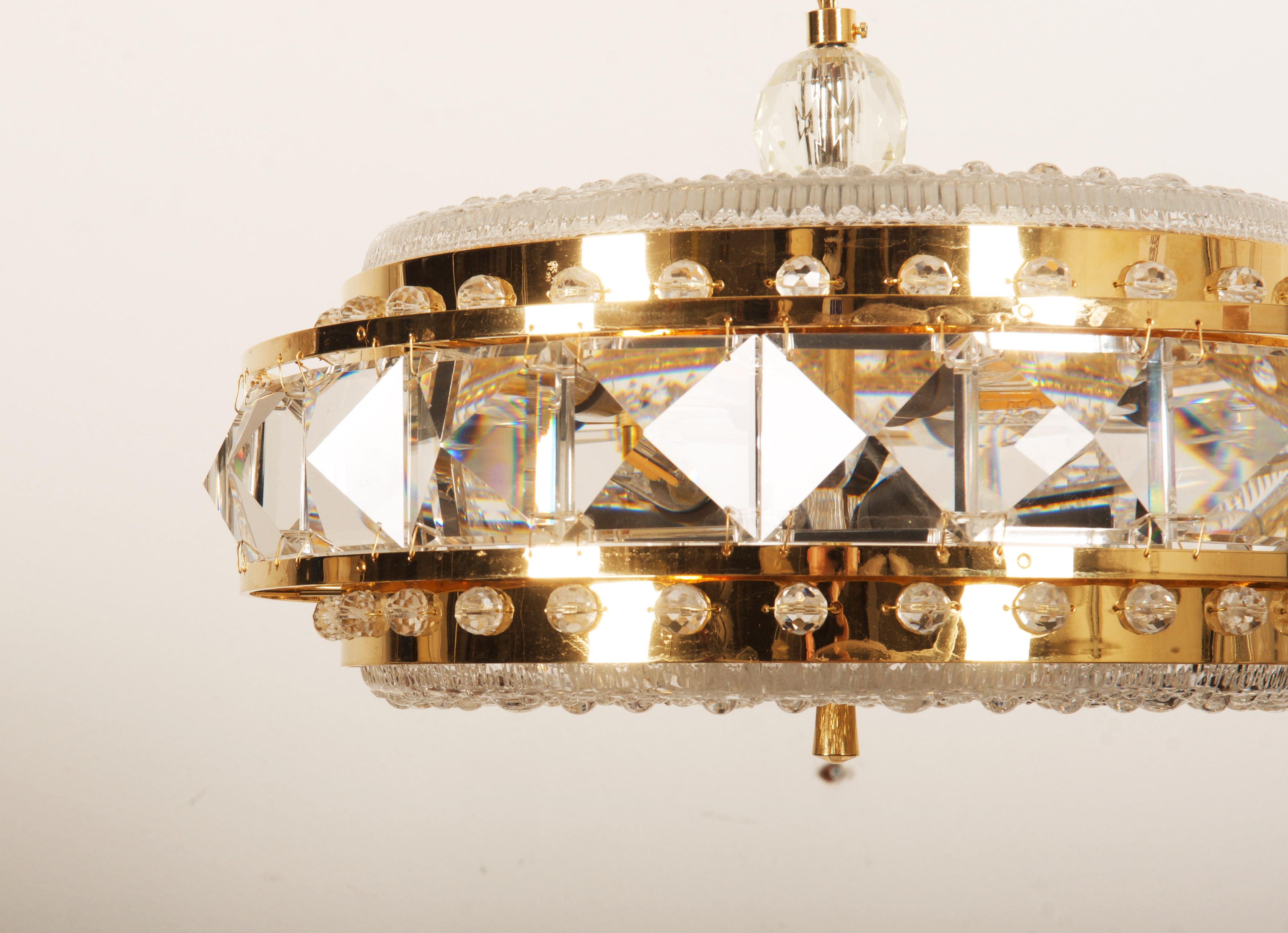 Pressed Brass and Glass Chandelier by Orrefors from the 1960s For Sale