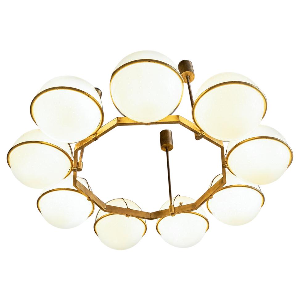 Incredible set of 3 large brass and glass chandelier in the style of Gino Sarfatti.
They were mounted from 1970 in Grand Hotel President hall.
Brass structure and 9 opaline glass in excellent condition.
Three chandeliers available.
Very good