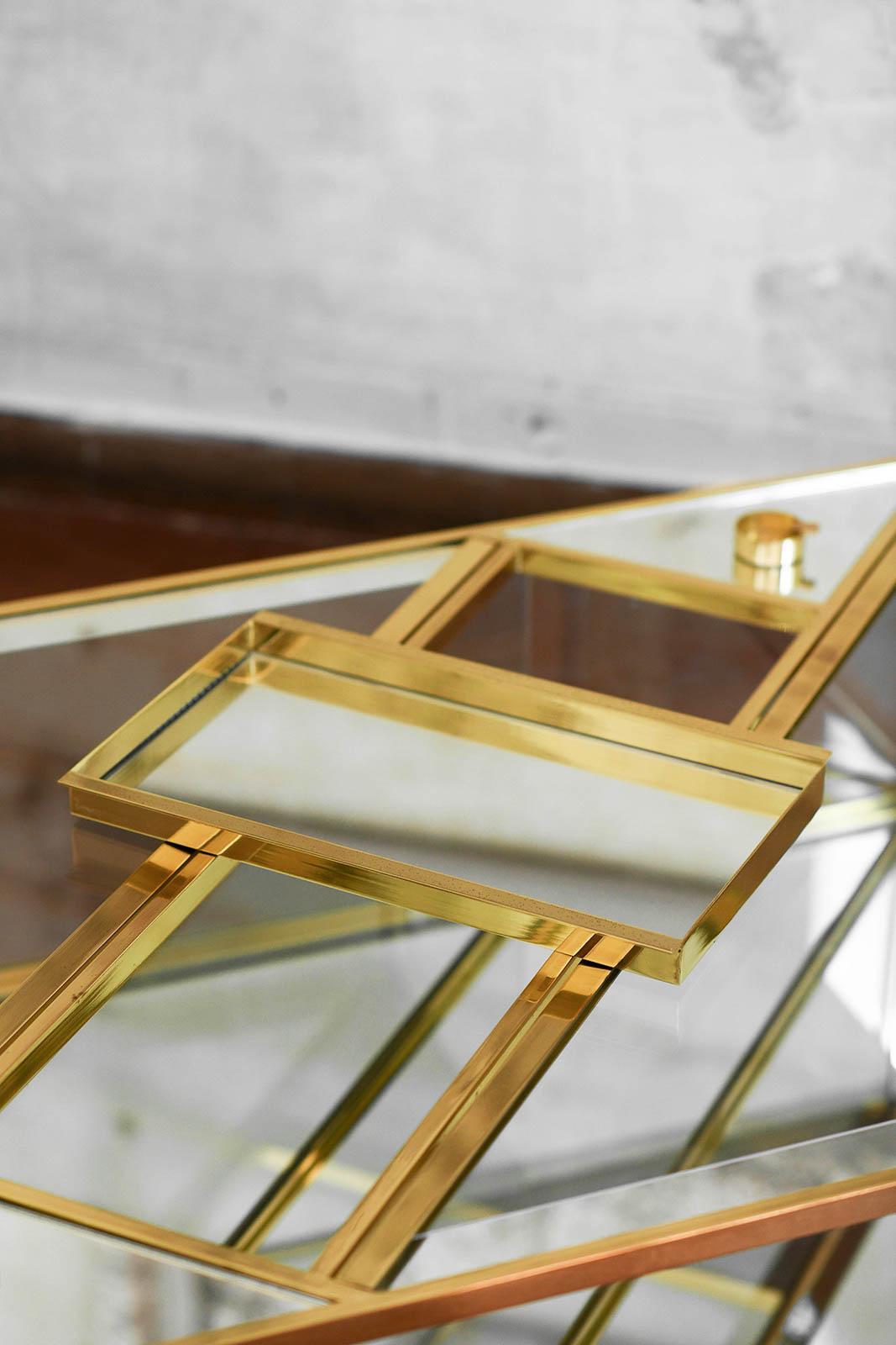 Late 20th Century Brass and glass coffee table with invisible wheels and removable tray, 1970 For Sale