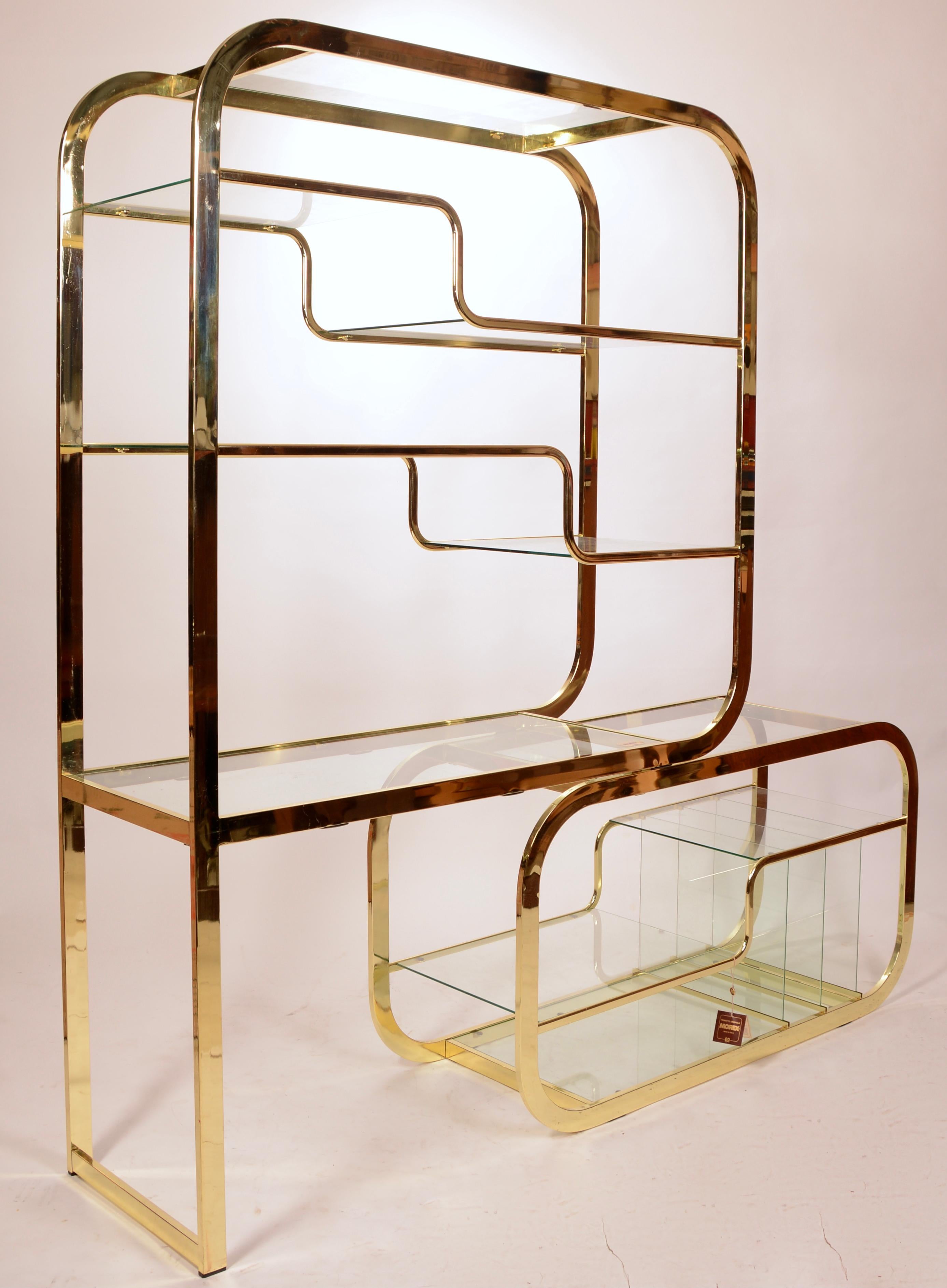 Brass and glass Etagere by Morex of Italy. This unit features a cantilever base that can moved to widen the design or make it more compact. Retains the original Morex of Italy sticker and tag.