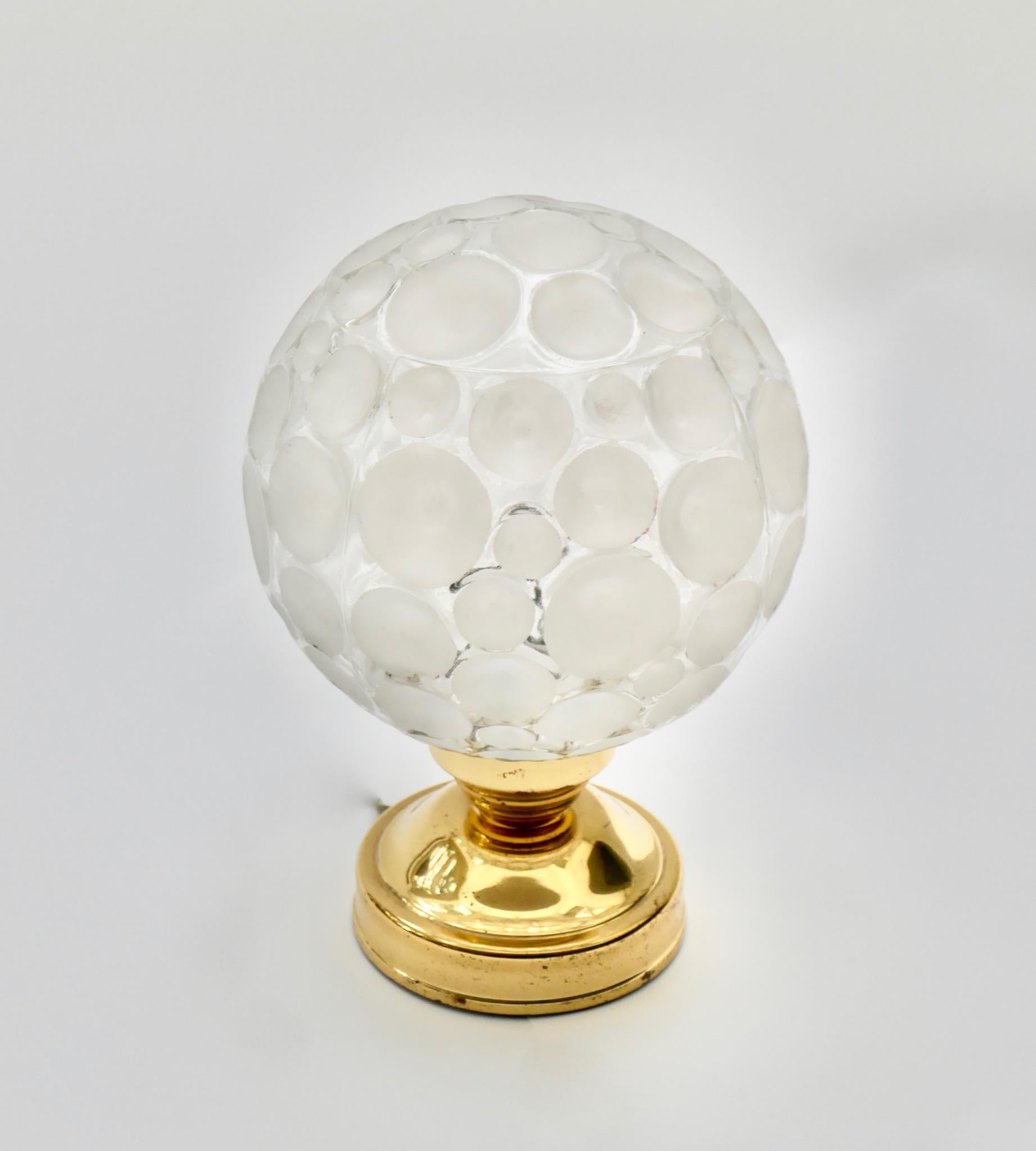 Brass and glass globe table lamp, Germany, 1970s.
