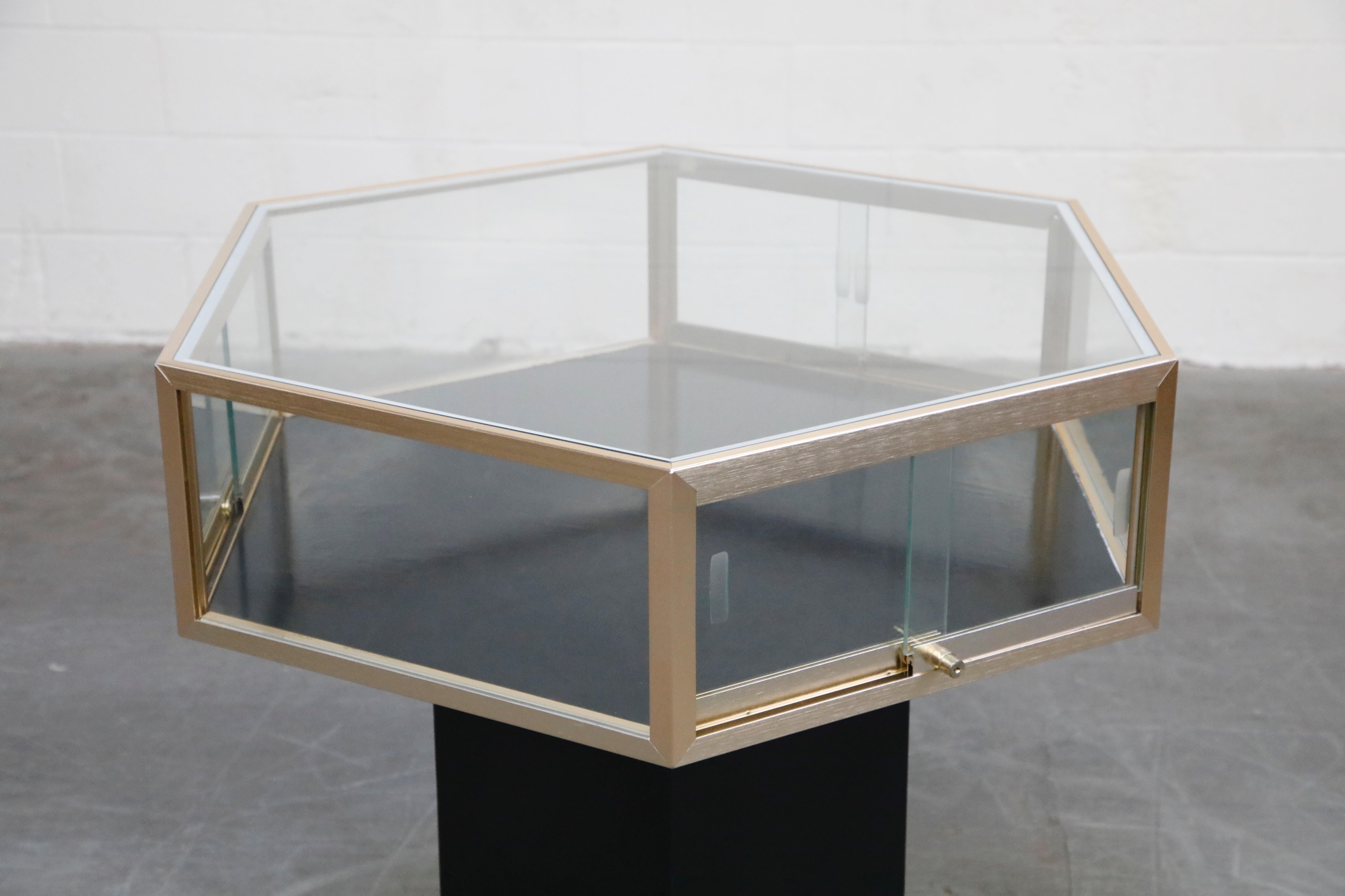 Brass and Glass Hexagonal Display Showcase Center Table, circa 1970s 7