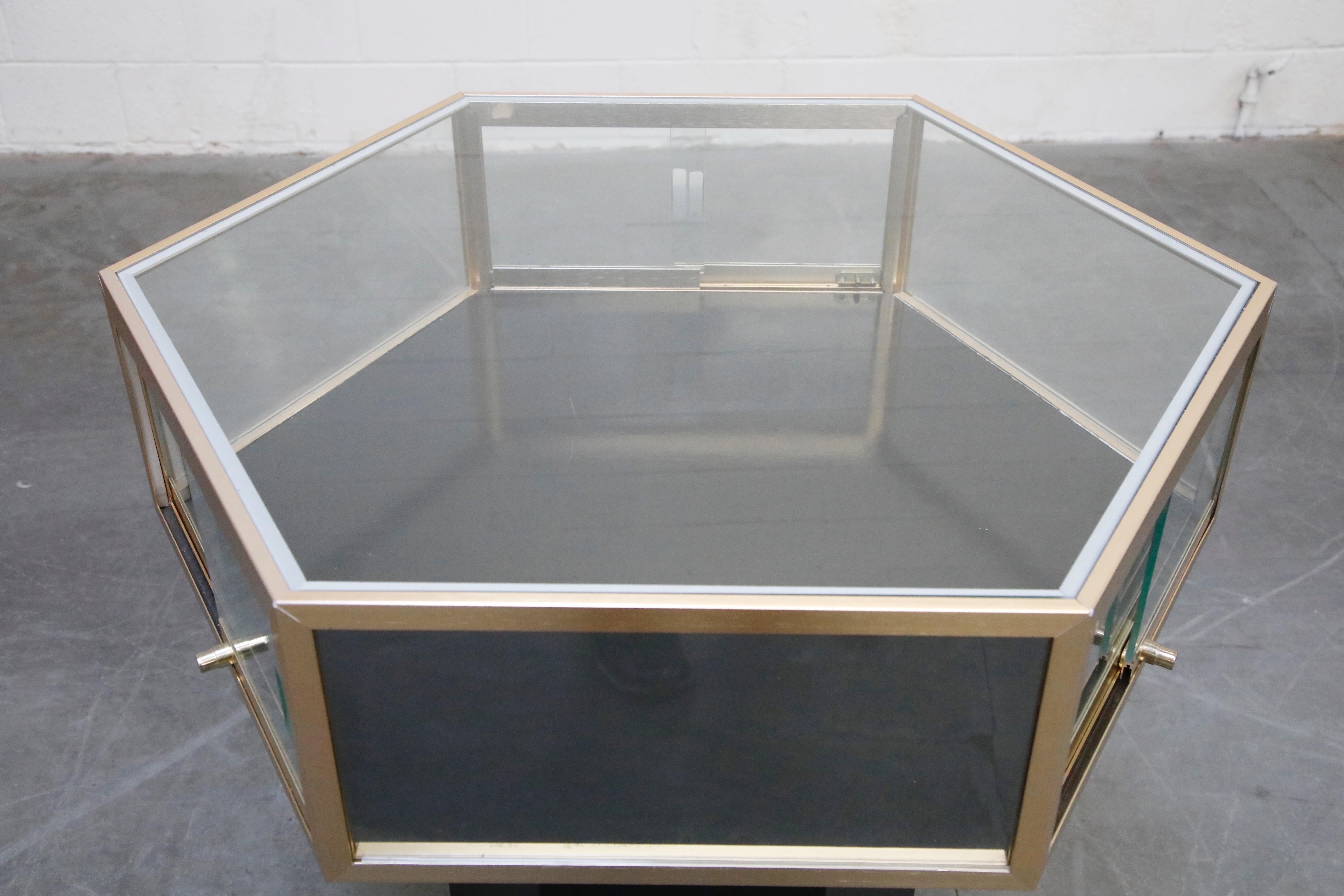 Brass and Glass Hexagonal Display Showcase Center Table, circa 1970s 11