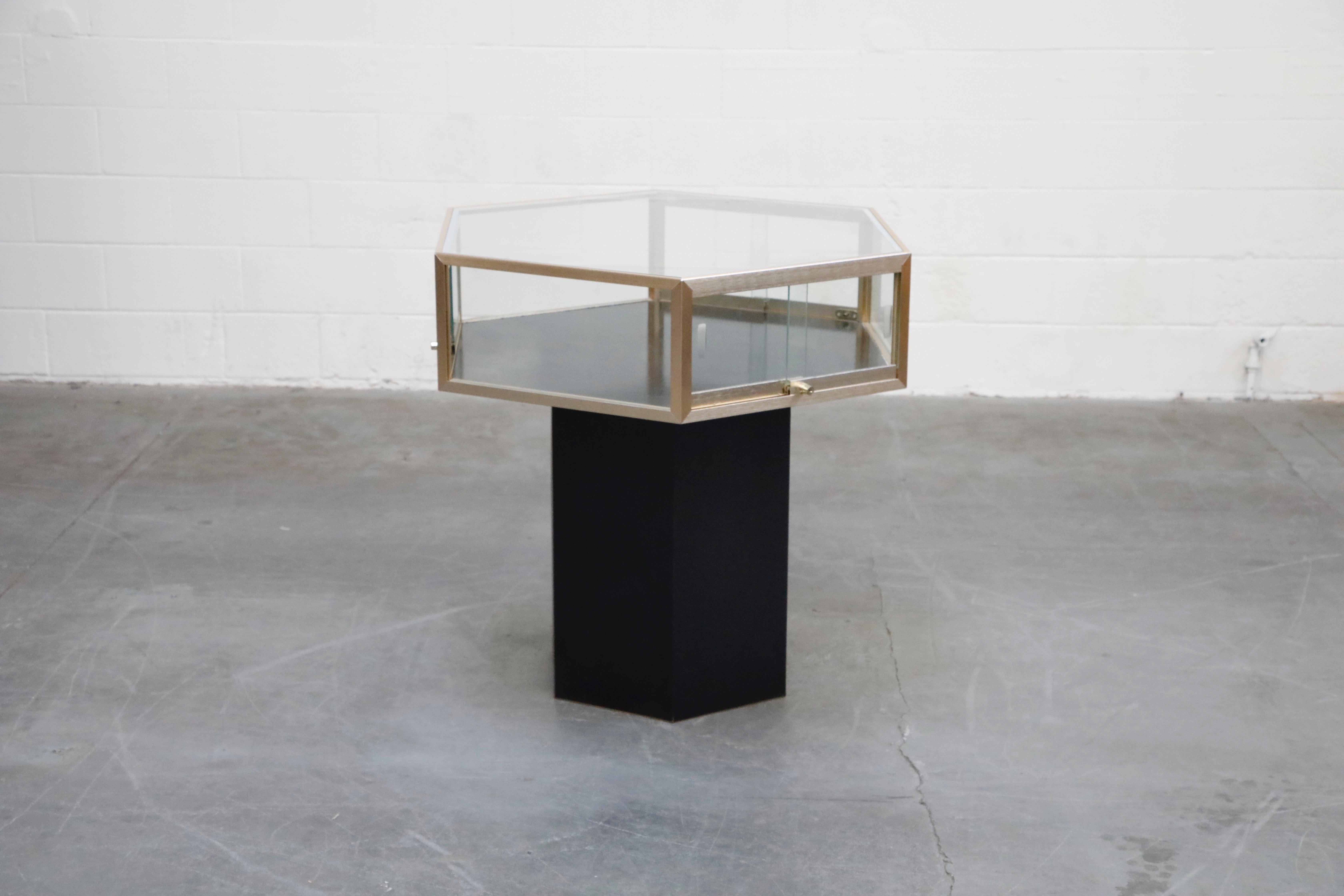 Brass and Glass Hexagonal Display Showcase Center Table, circa 1970s In Good Condition In Los Angeles, CA