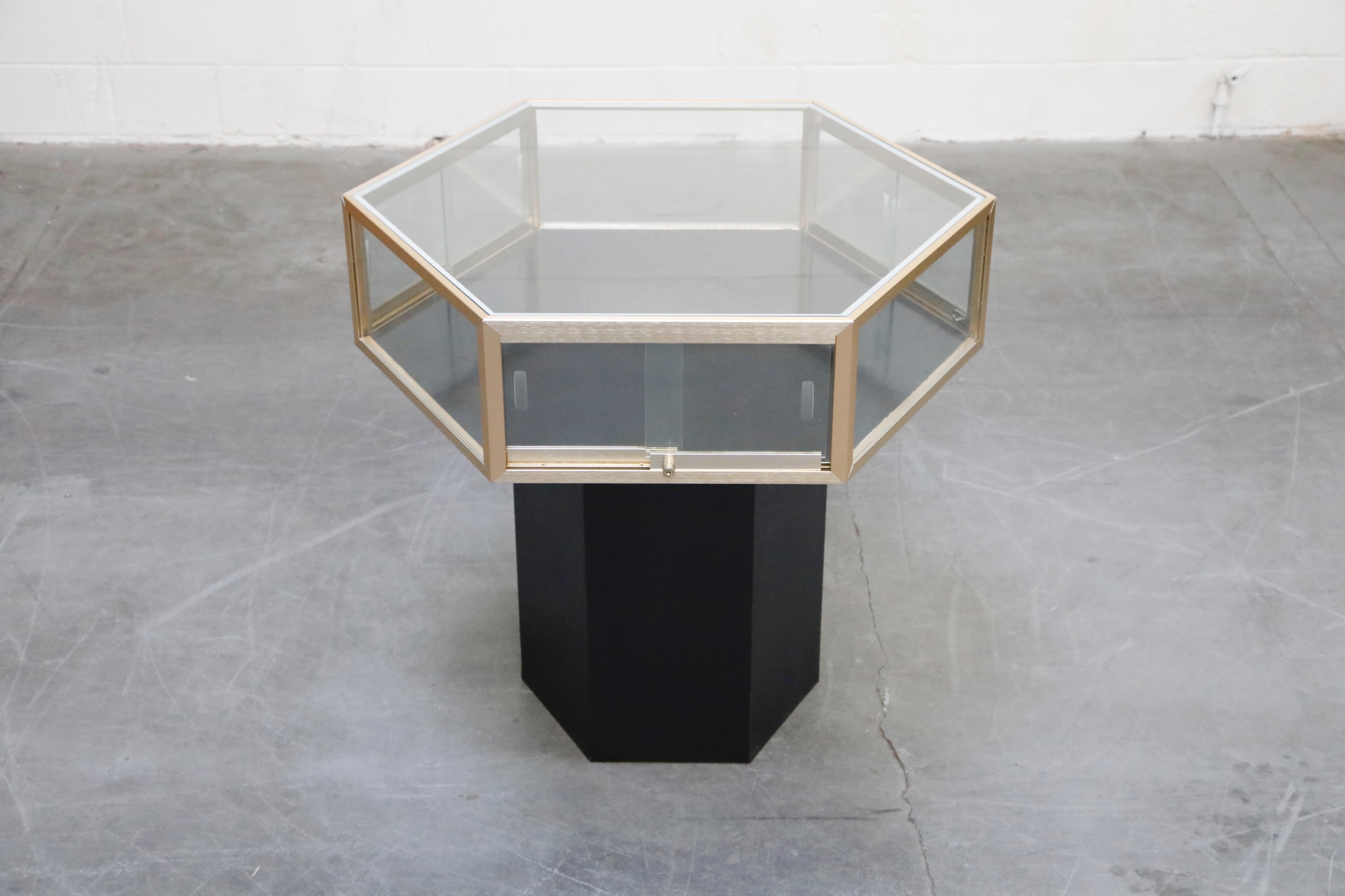 Late 20th Century Brass and Glass Hexagonal Display Showcase Center Table, circa 1970s